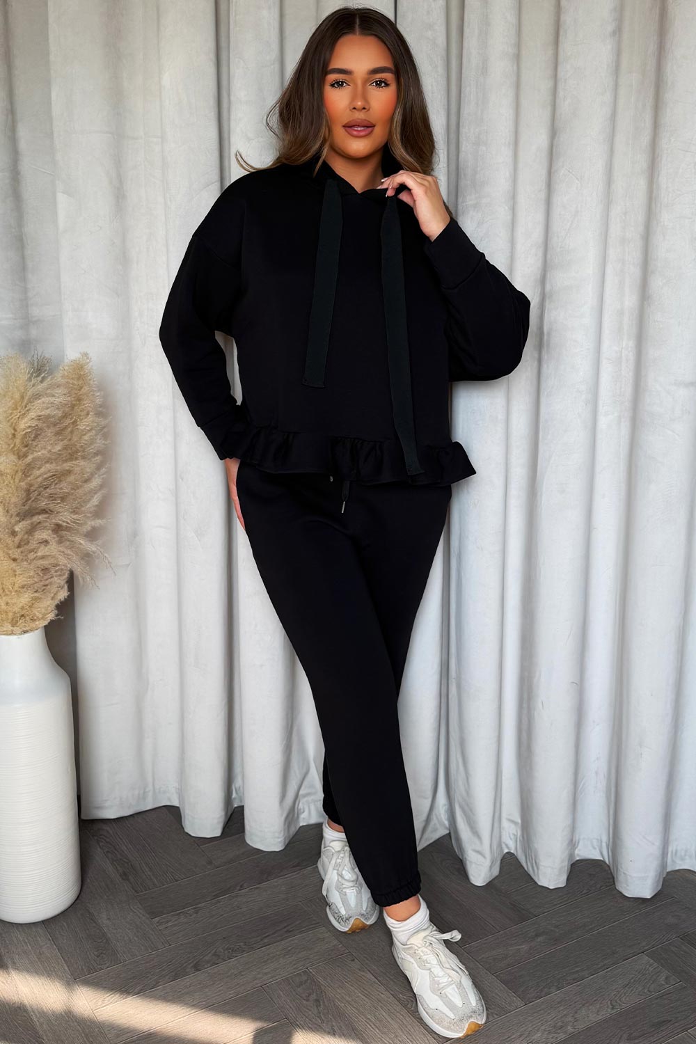 black hooded lounge set with peplum ruffle frill hem womens co ord set for winter