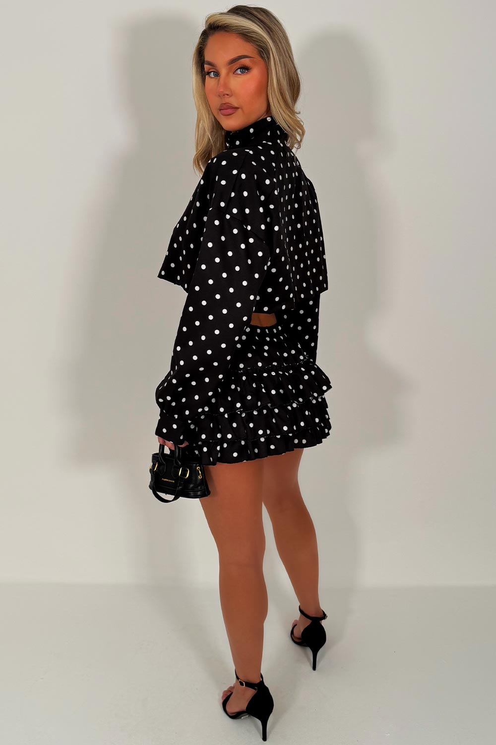 polka dot long sleeve crop jacket and ruffle frilly skort two piece set styledup going out outfits