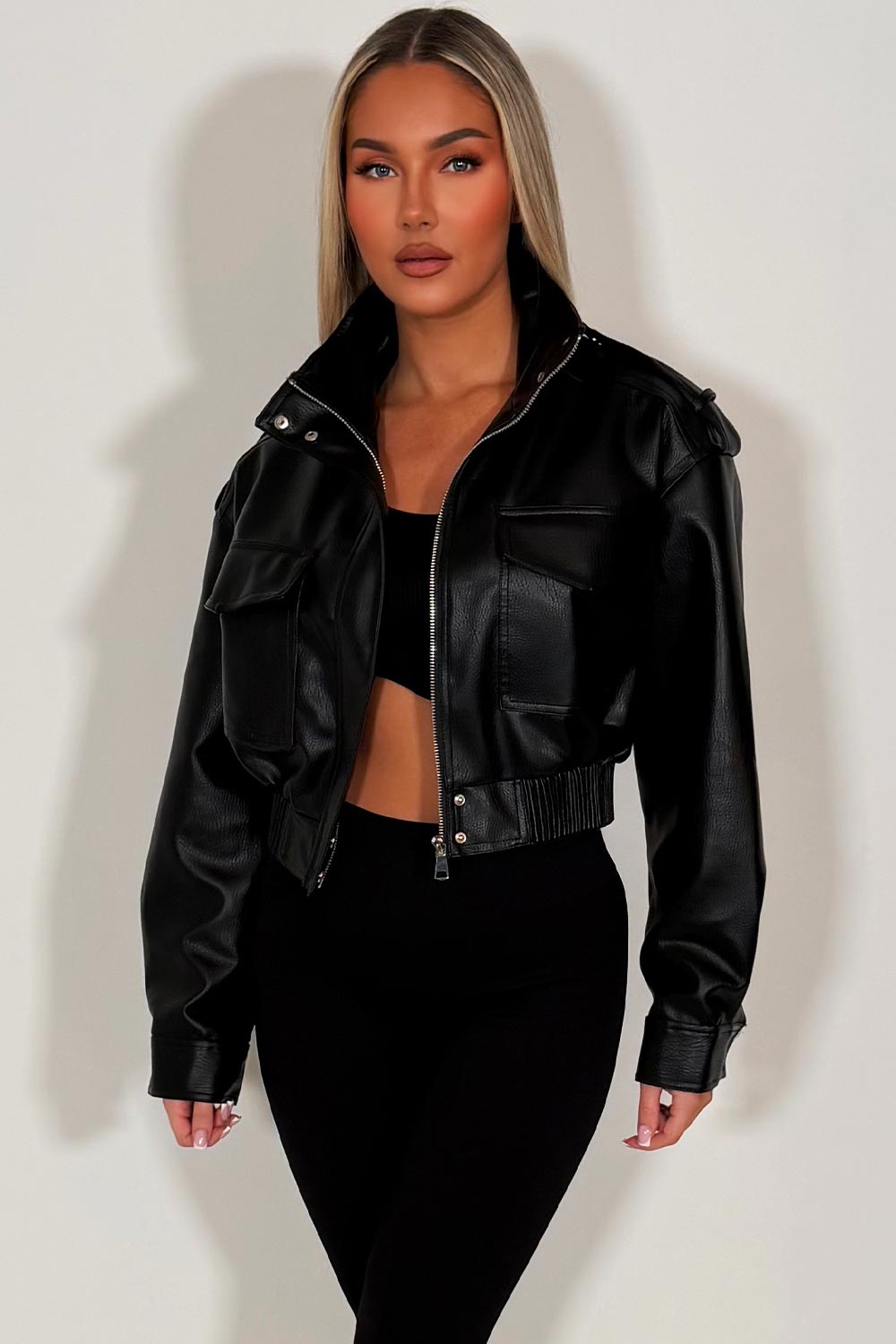 womens zara faux leather jacket with front pockets shoulder tabs elasticated hem black styledup