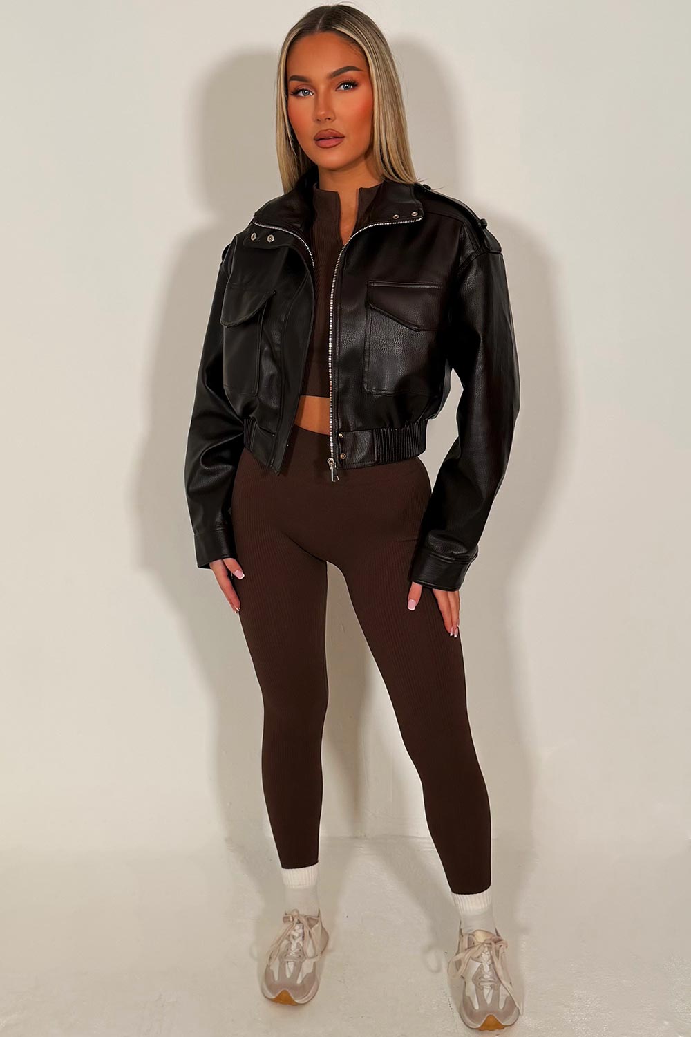 womens zara faux leather jacket with front pockets shoulder tabs elasticated hem brown styledup