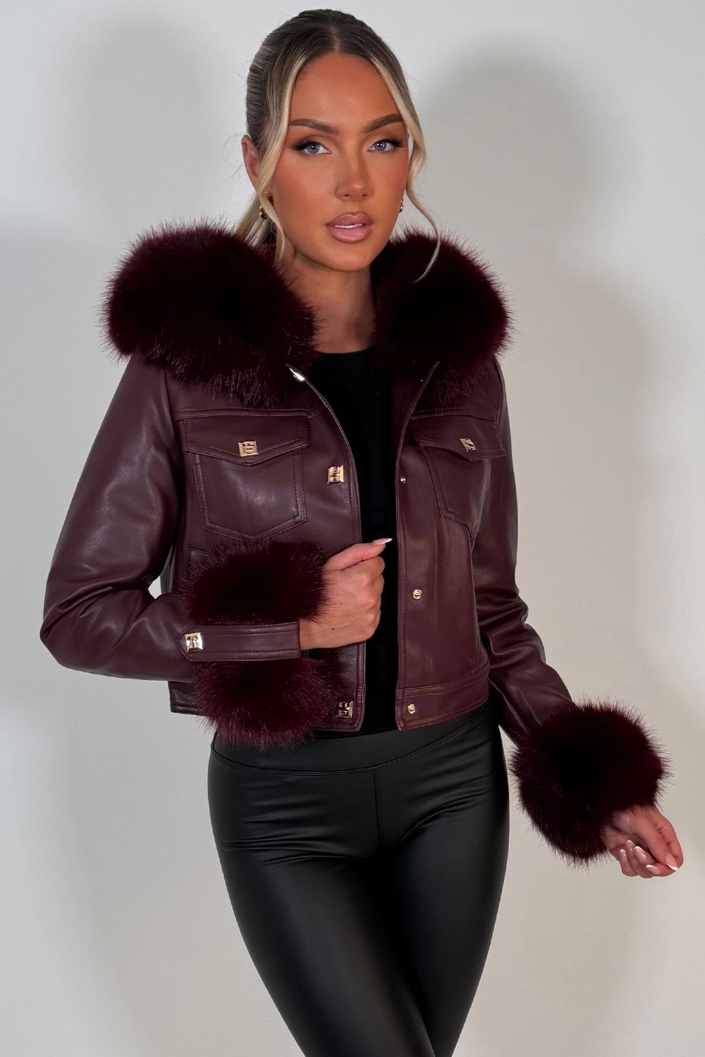 black faux fur hood faux fur cuff faux leather jacket with gold buttons styledup uk