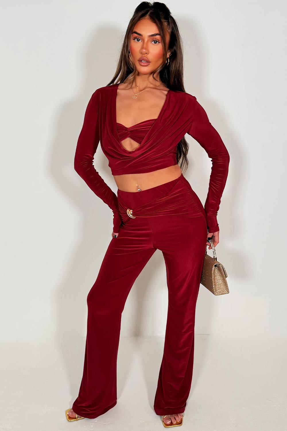 gold buckle twist front skinny flare trouser and long sleeve cut out twist front crop top two piece co ord set styledup