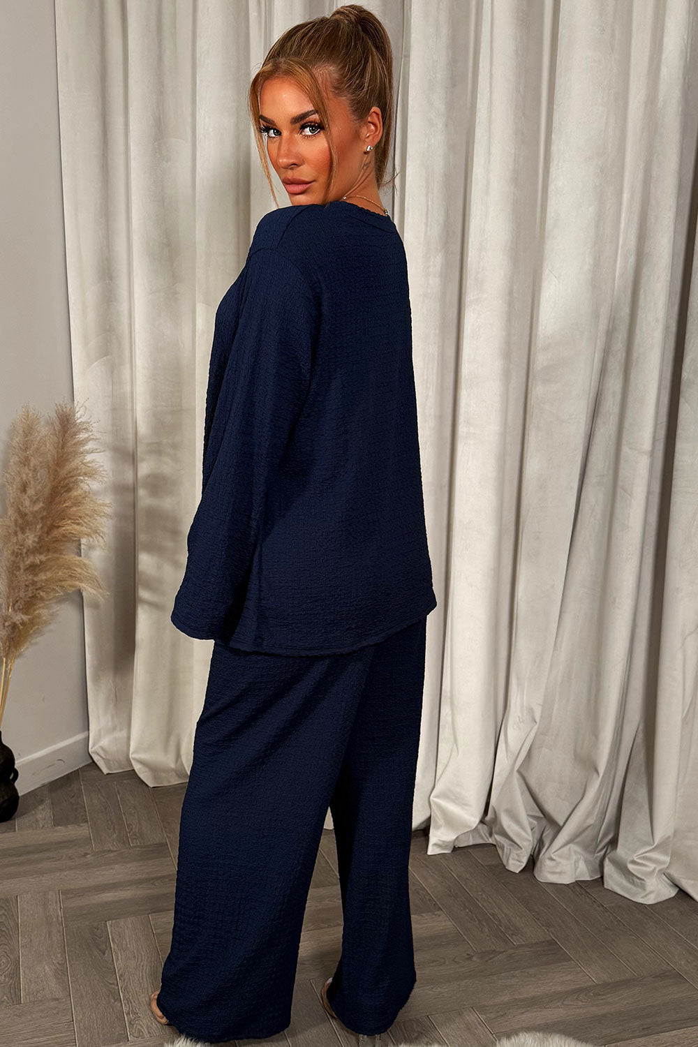 long sleeve top trouser co ord set with gold buckle christmas party outfit