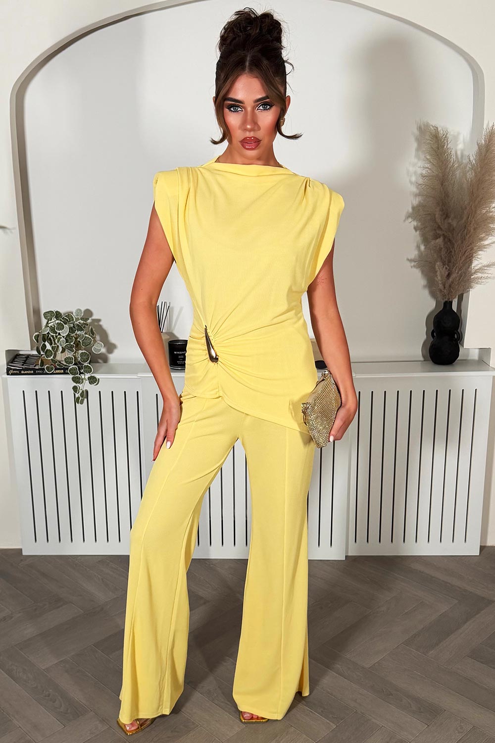 womens padded shoulder top with gold buckle and wide leg trousers two piece going out outfit set styledup