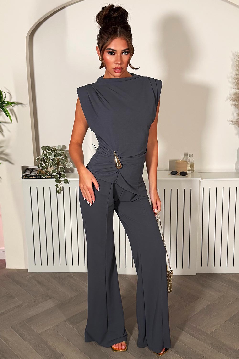 womens padded shoulder top with gold buckle and wide leg trousers two piece going out outfit set styledup