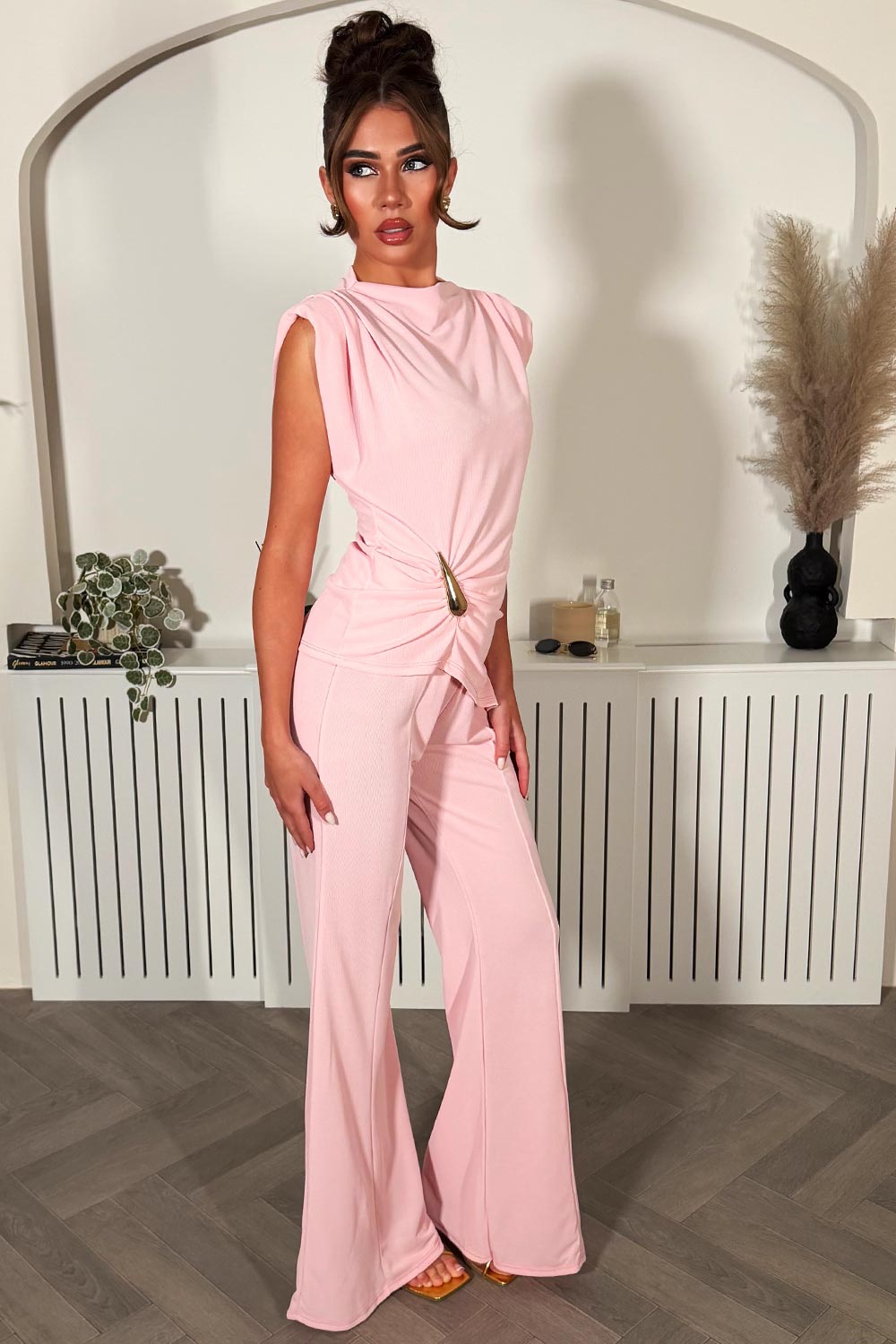 womens padded shoulder top with gold buckle and wide leg trousers two piece going out outfit set styledup