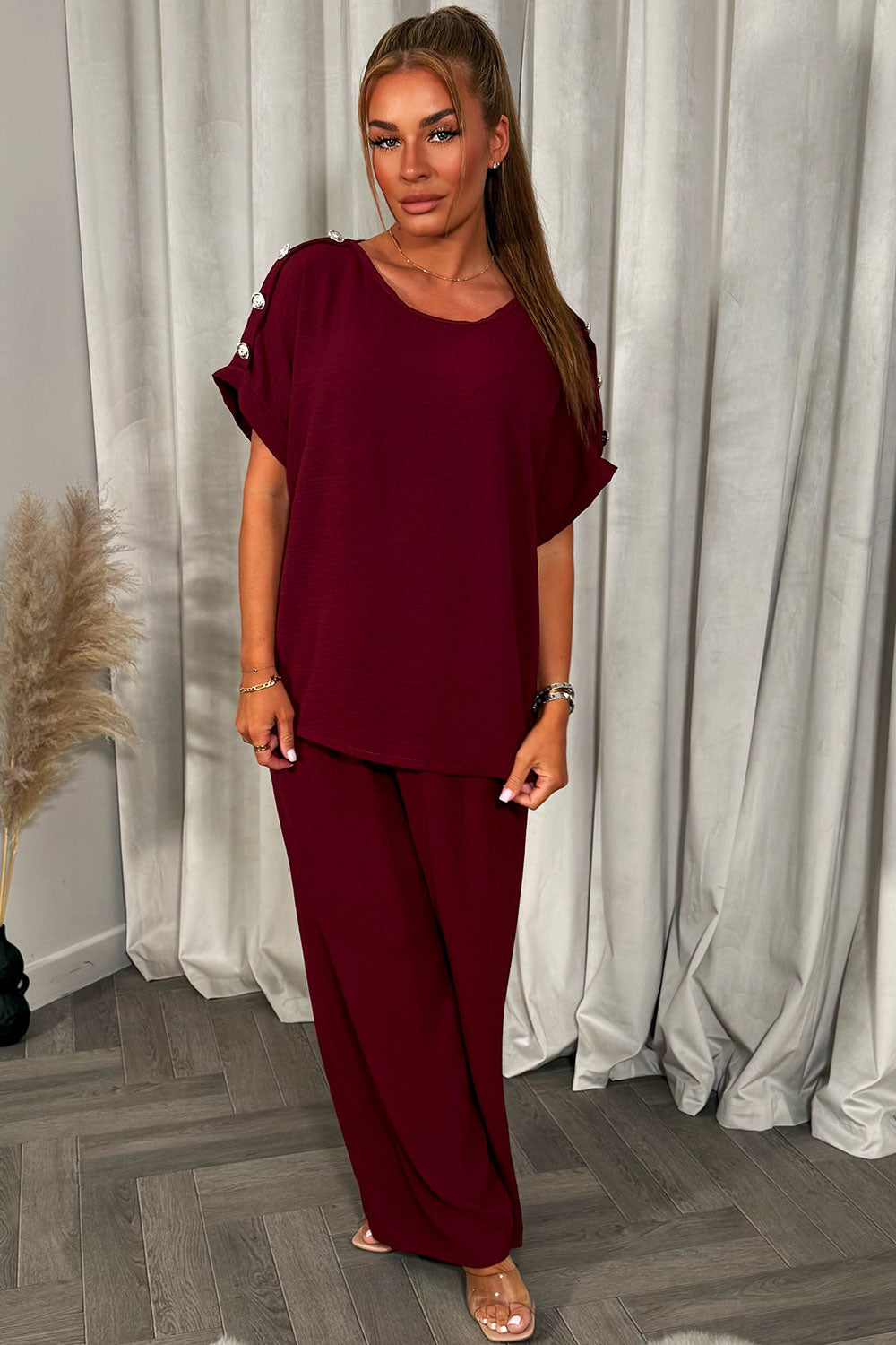 gold button shoulder top and trousers co ord set christmas party outfit