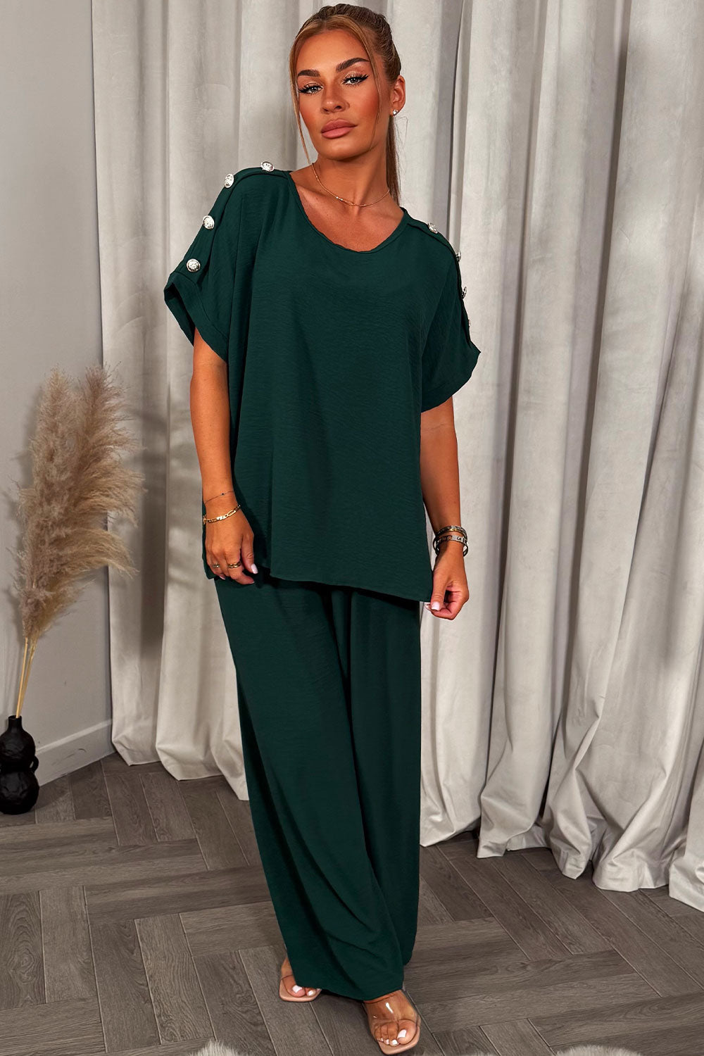 christmas party co ord with gold button shoulder top and trousers outfit for womens