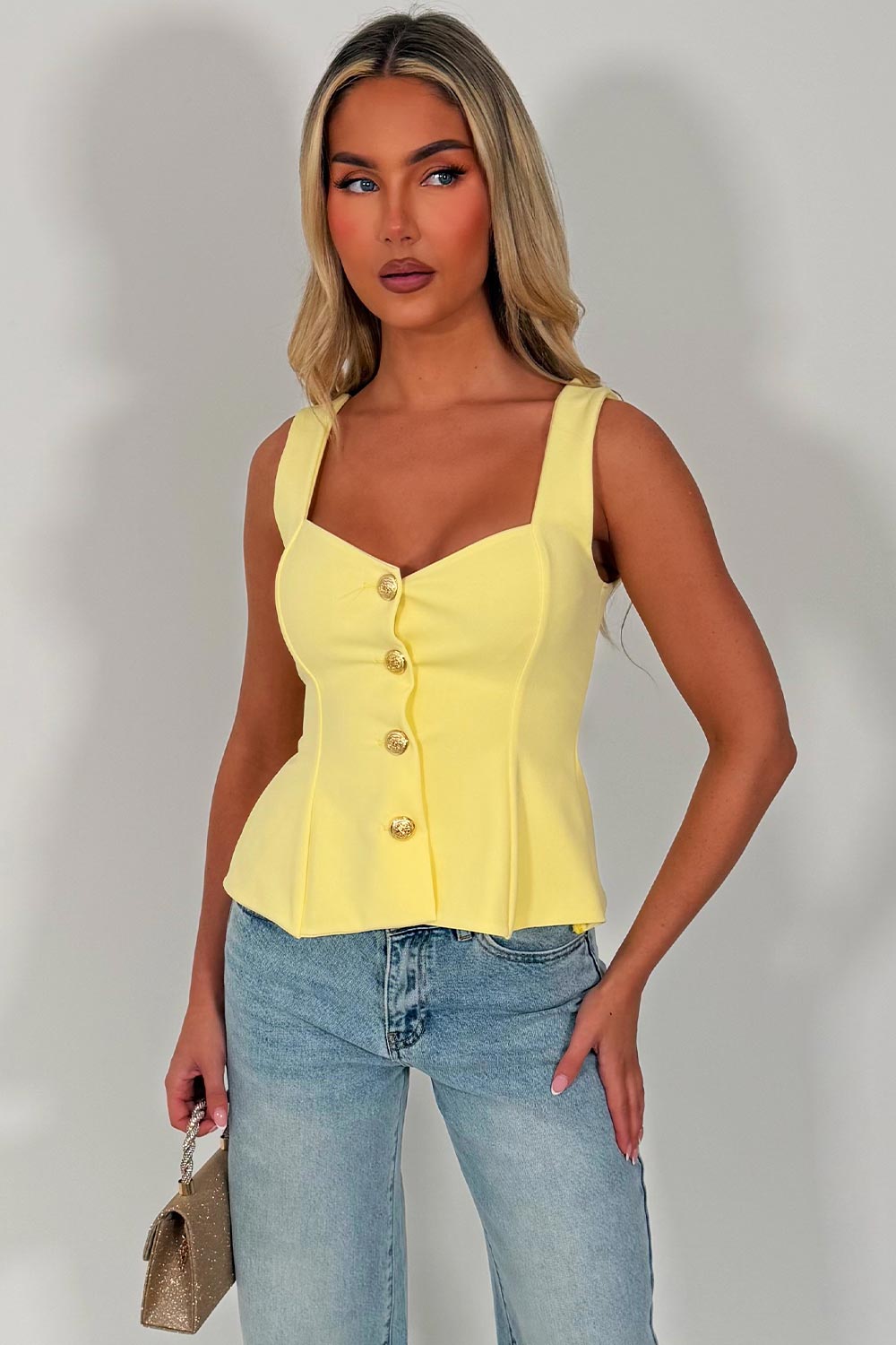 going out peplum top with gold buttons styledup