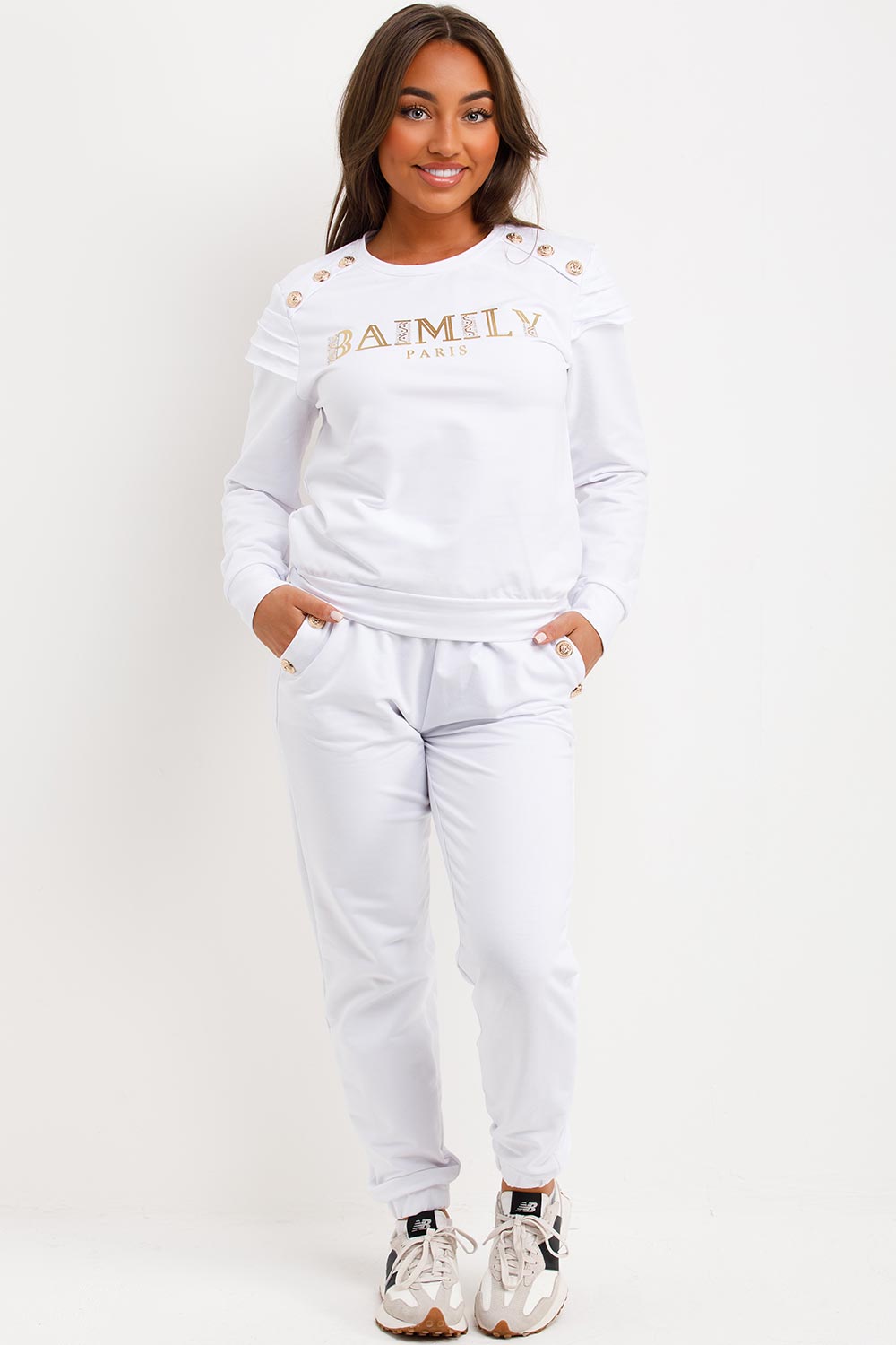 frill shoulder gold button top and trousers tracksuit set airport outfit