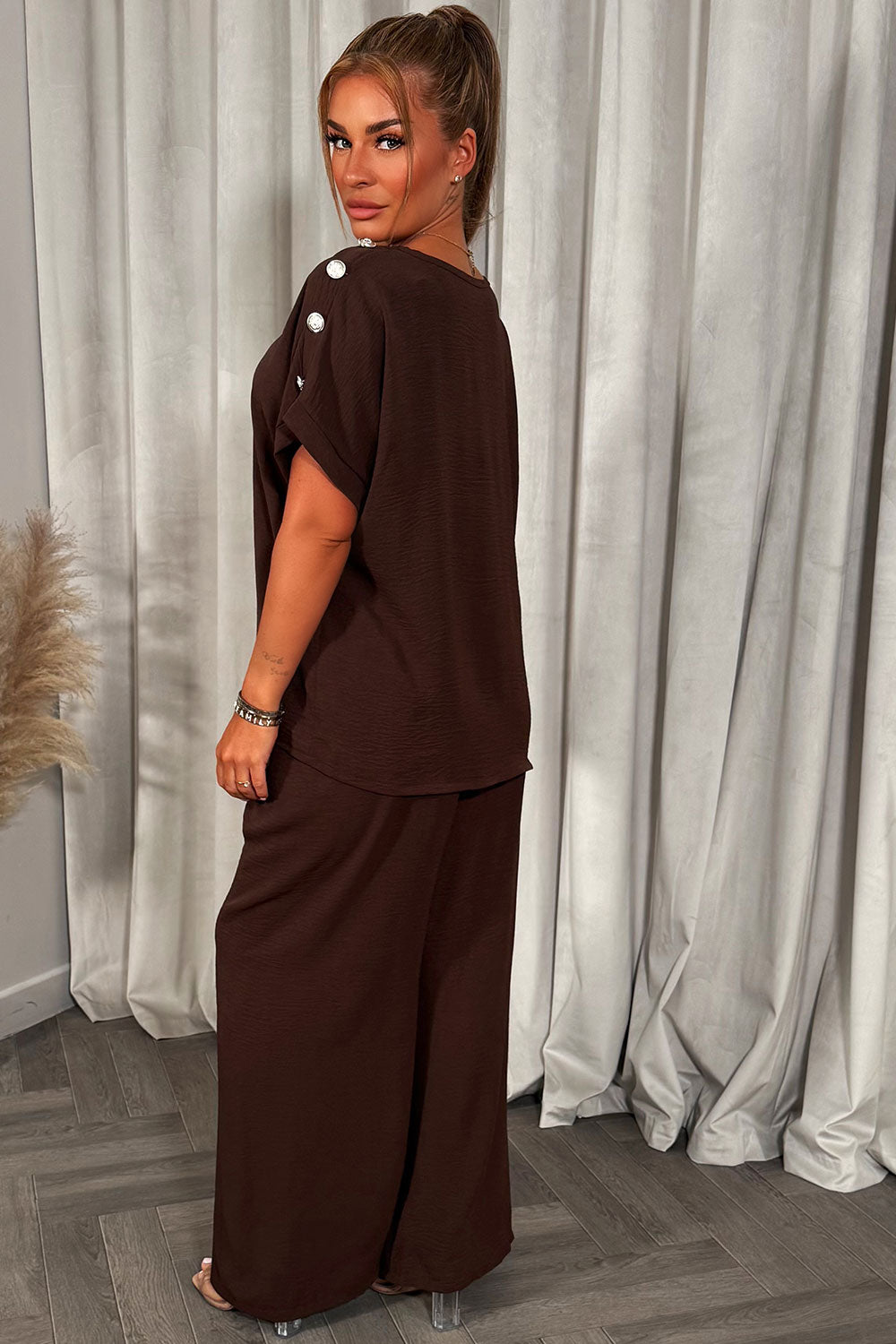 christmas party co ord with gold button shoulder top and trousers outfit for womens