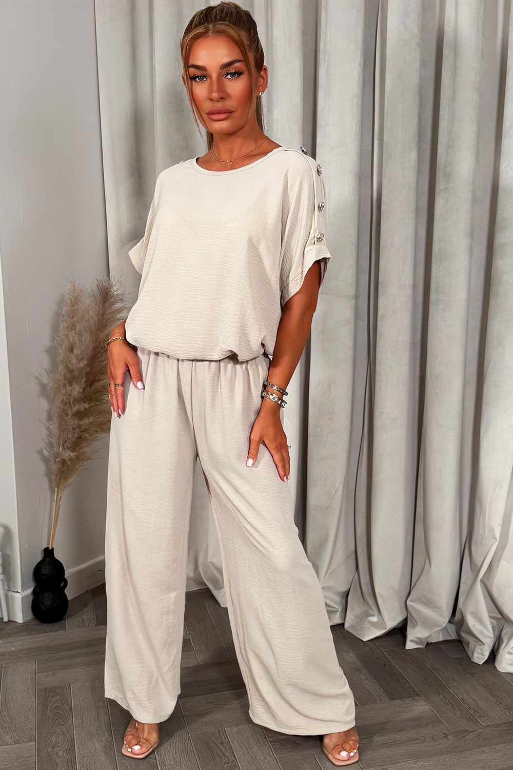 womens christmas party outfit top with gold button shoulder and matching trousers two piece co ord set