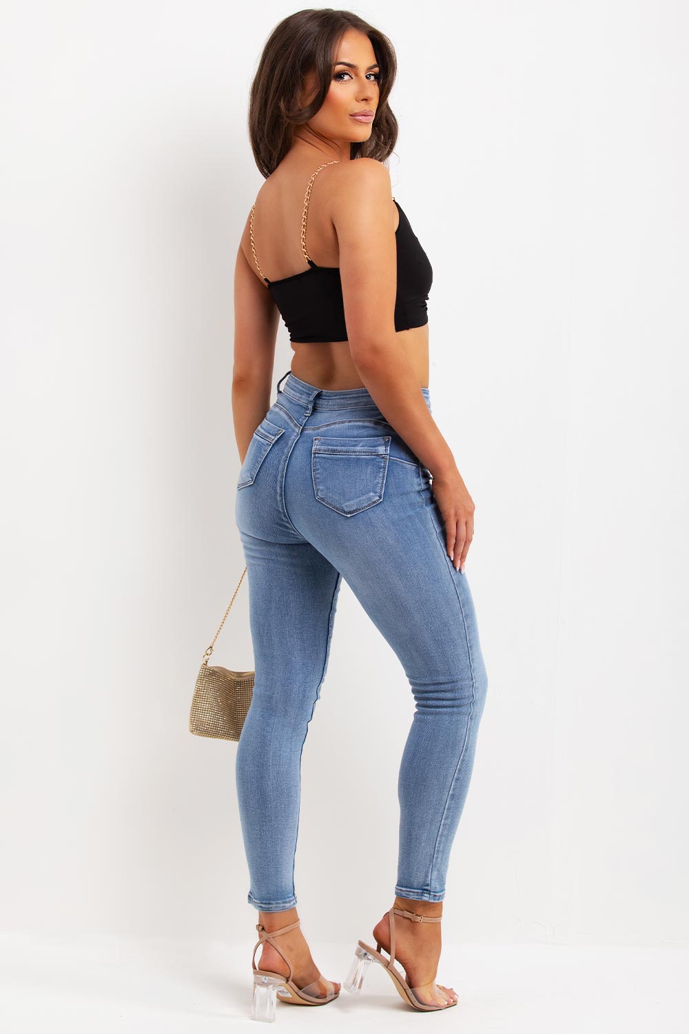 twisted front crop top with gold chain straps festival outfit