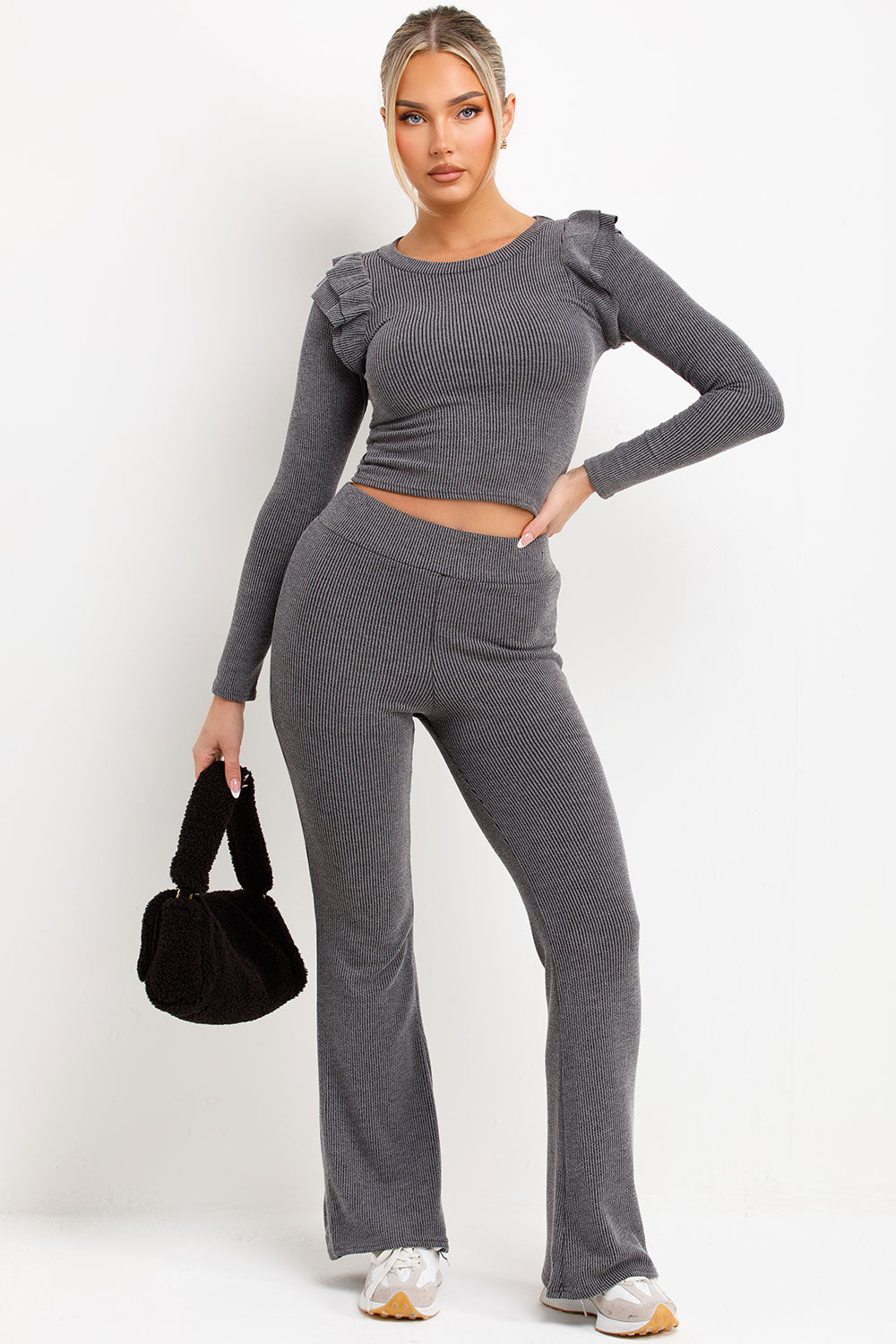 ribbed long sleeve frill shoulder top and skinny flare trousers two piece loungewear set womens