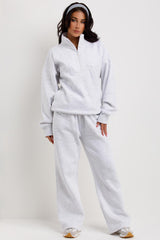 half zip sweatshirt and straight leg joggers tracksuit co ord airport outfit