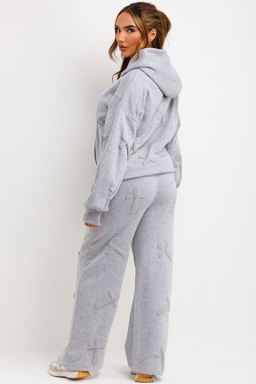 hoodie and joggers tracksuit set with bubble puffed up crosses styled up