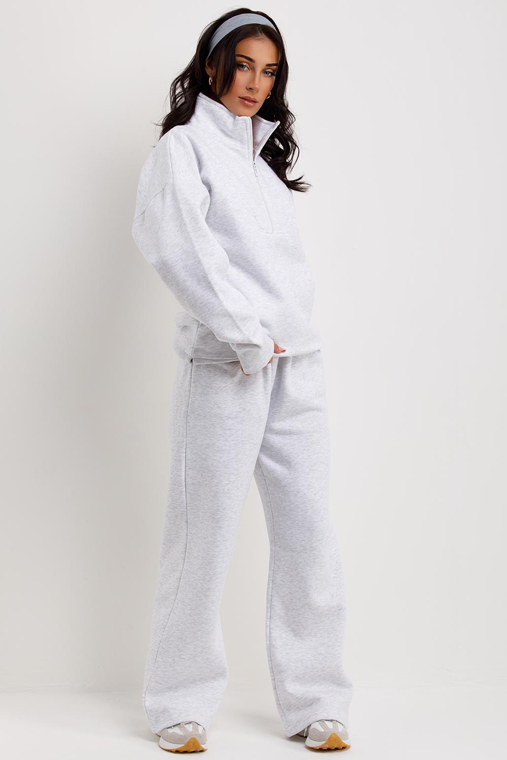 womens straight leg joggers and half zip sweatshirt tracksuit airport outfit