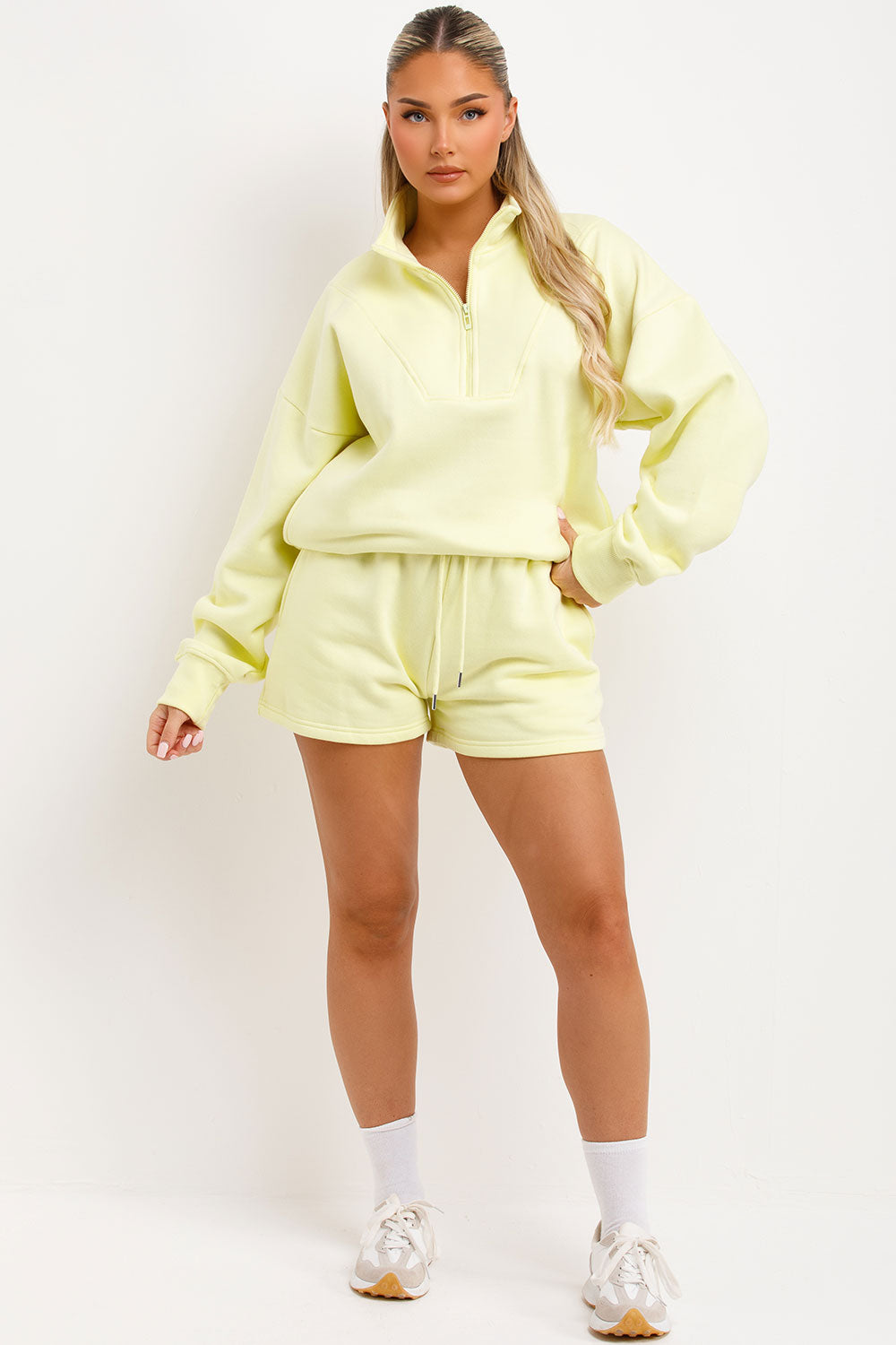 womens runner shorts and half zip jumper tracksuit lounge set airport outfit uk