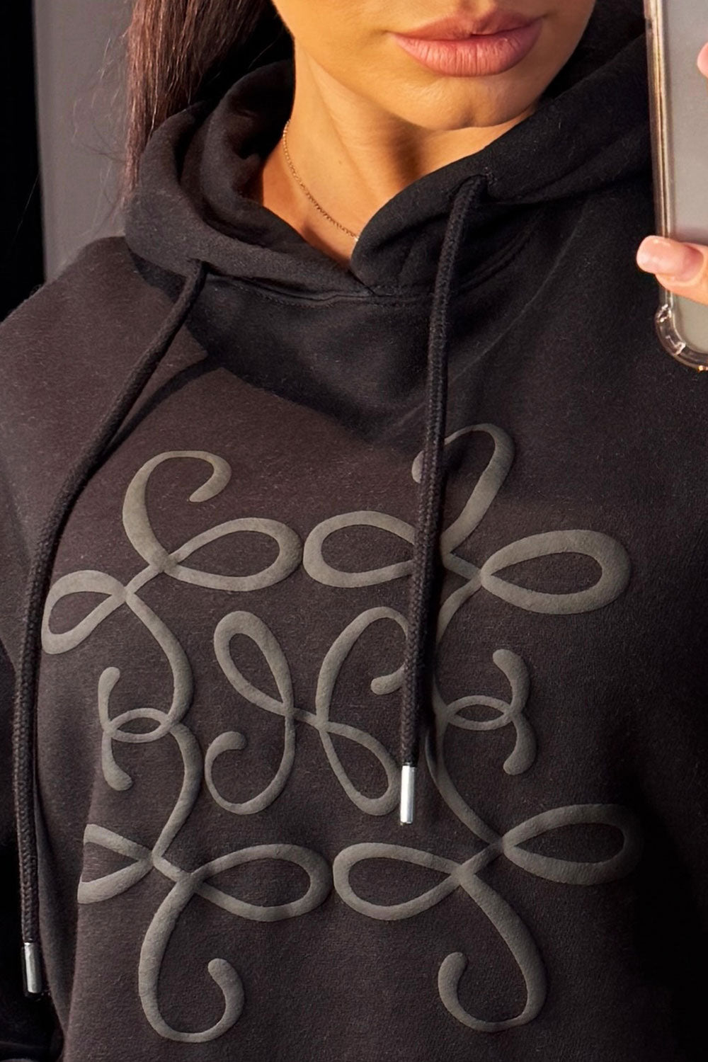 womens oversized hoodie swirl detail loewe inspired