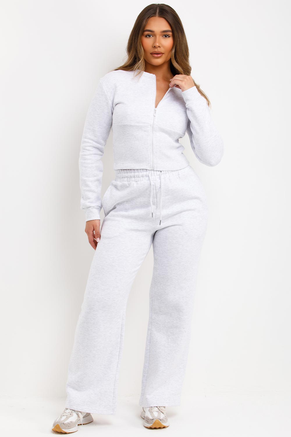 grey marl zip up corset crop sweatshirt and joggers tracksuit travelling airport outfit styledup