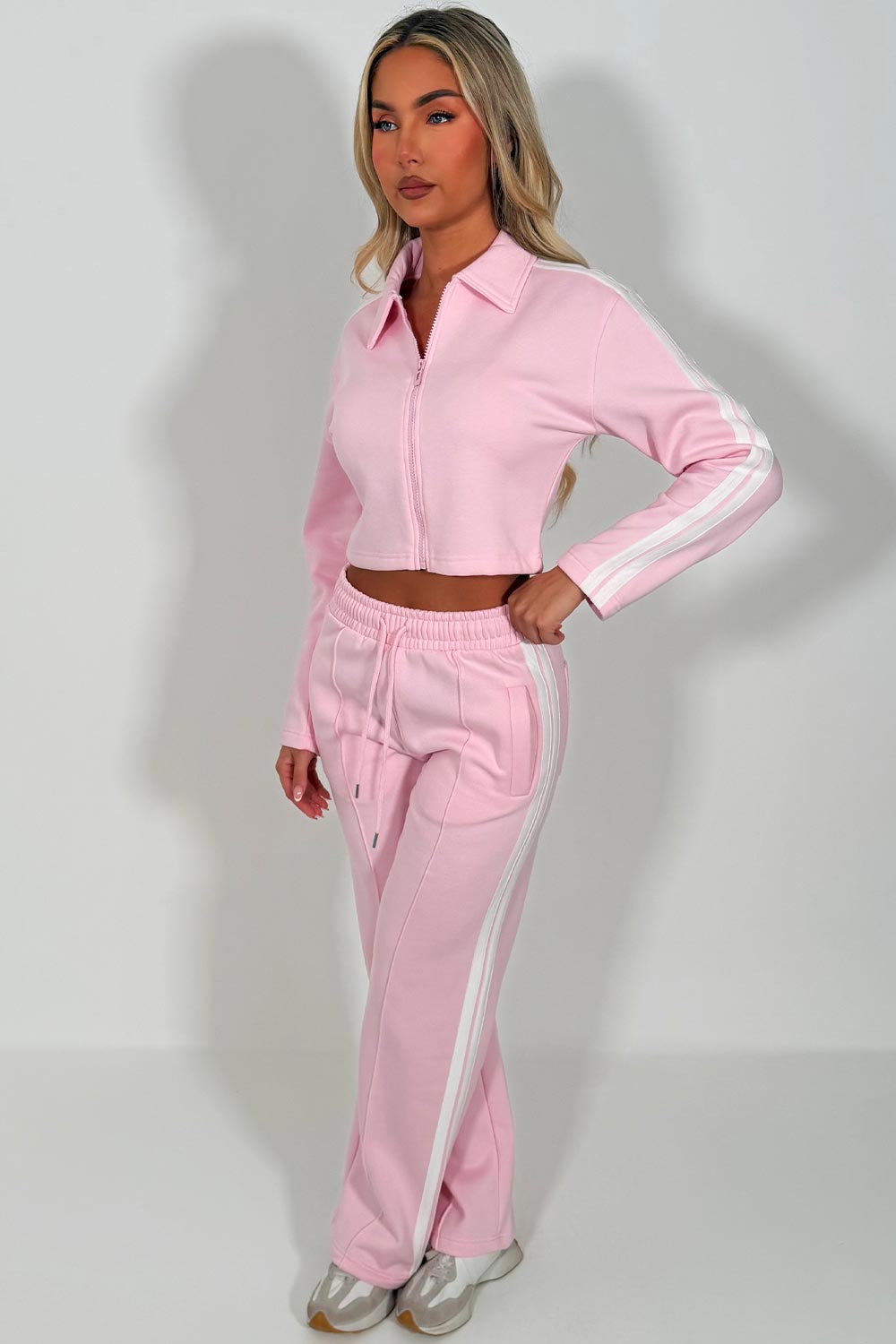 womens pink crop sweatshirt and wide leg joggers tracksuit with side stripes airport outfit casual everyday outfit styledup uk white fox