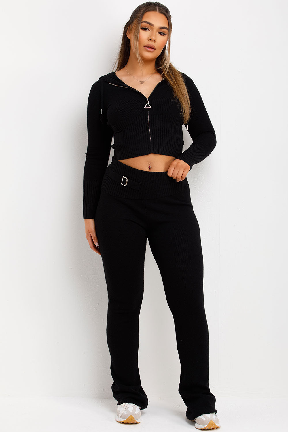 womens zip up crop hoodie and fold over waist buckle detail skinny flare trousers co ord set airport outfit