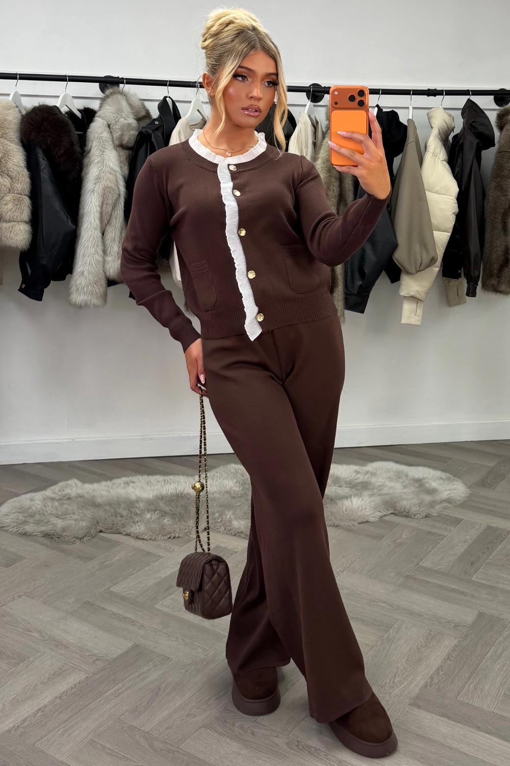 womens knitted wide leg trousers and jumper top with gold button detail night out Christmas party occasion outfit for winter uk