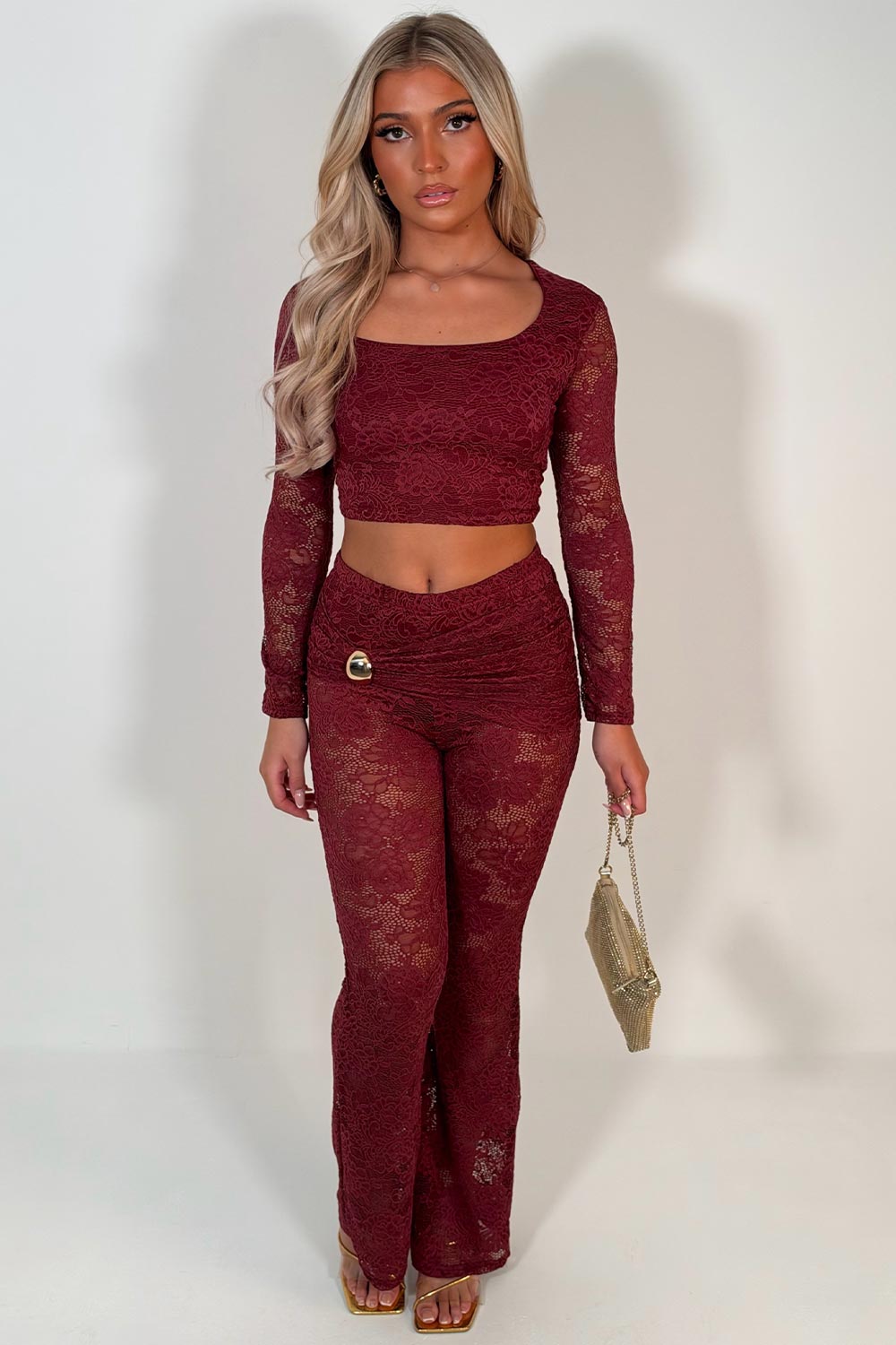 burgundy long sleeve lace crop top and matching trousers with gold buckle styledup uk