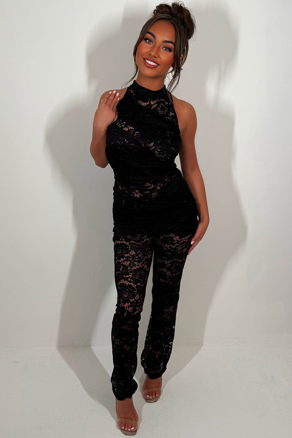 black lace jumpsuit with rose applique