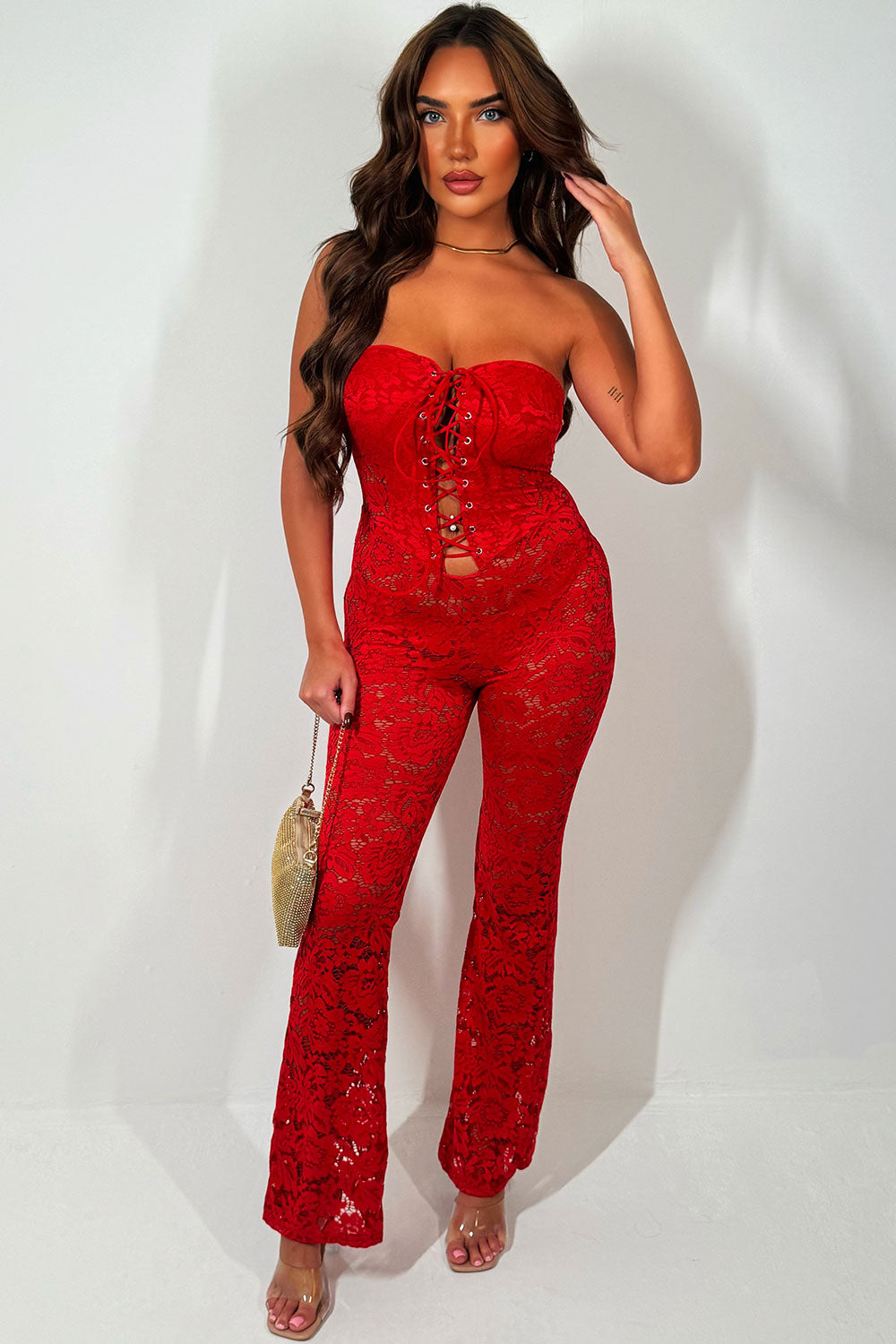 red womens lace jumpsuit with skinny flared legs christmas party outfit