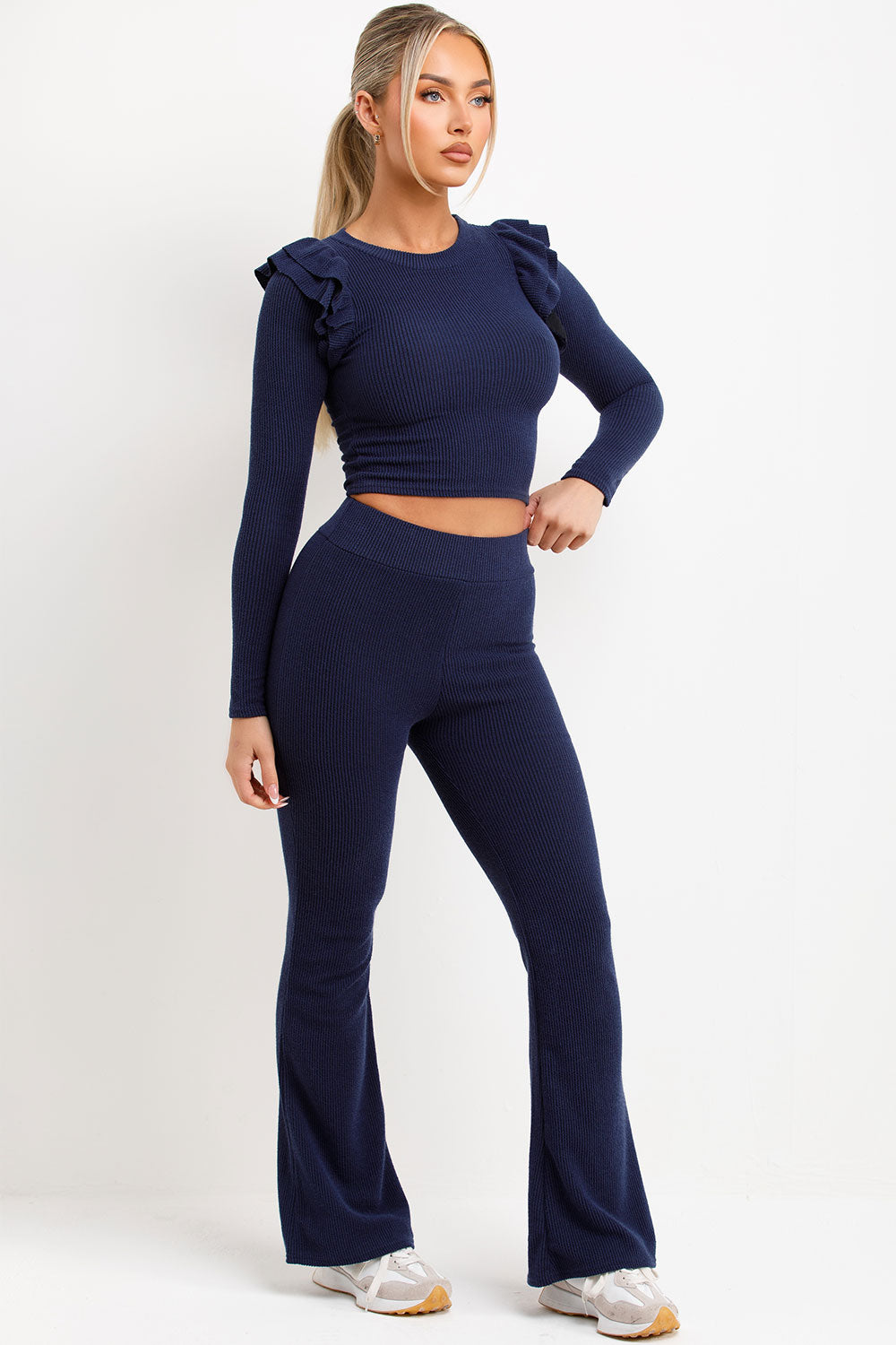 ribbed long sleeve frill shoulder top and skinny flare trousers two piece loungewear set womens