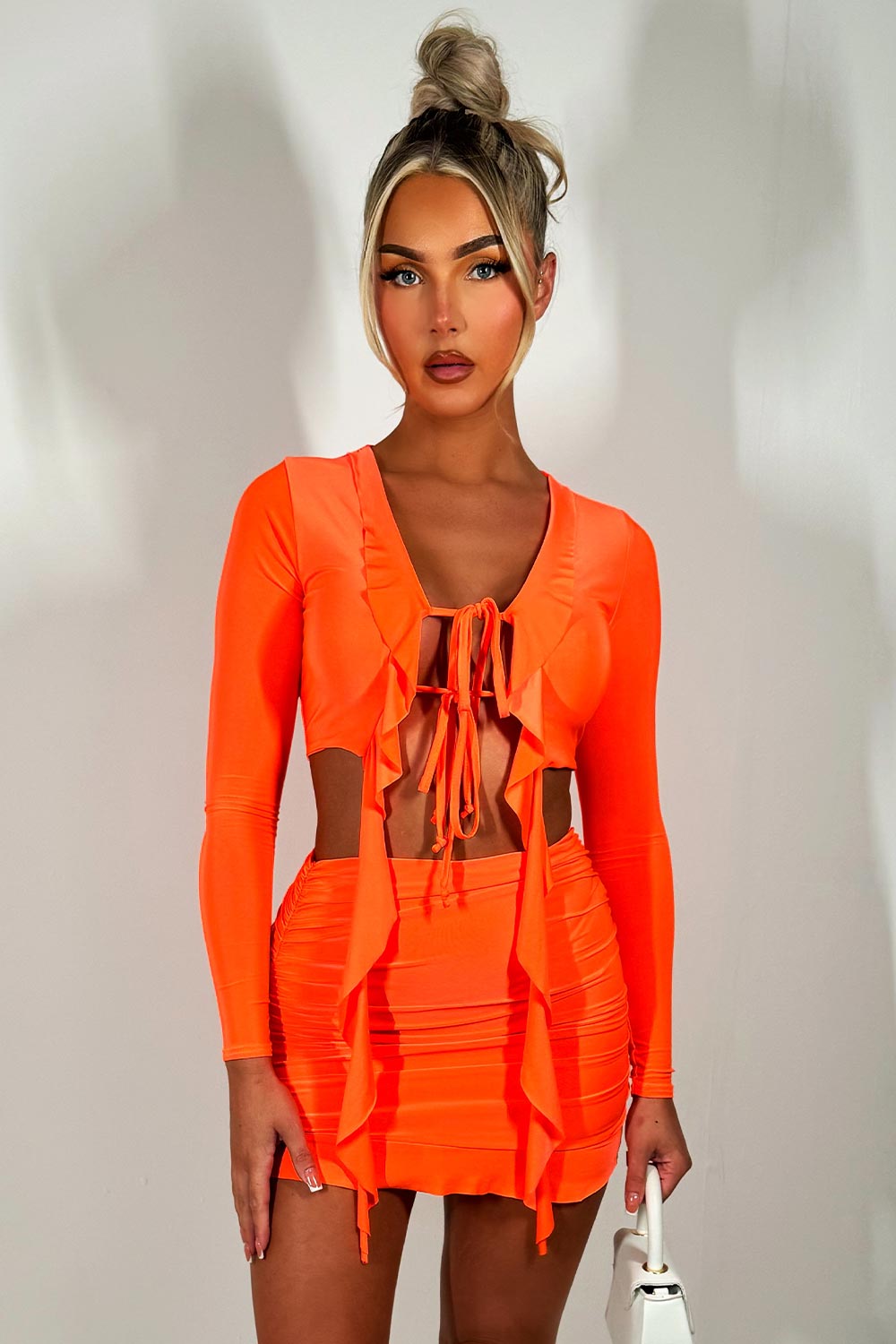 neon orange skirt and frilly tie front crop top set festival going out holiday outfit