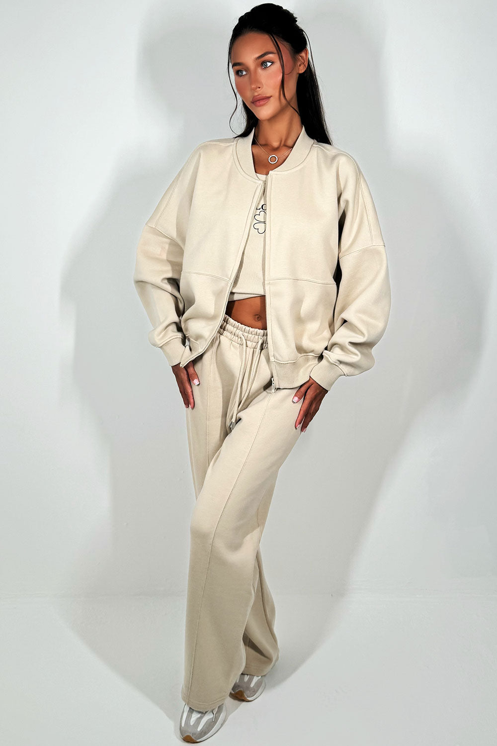 bomber sweatshirt straight leg joggers and ribbed vest top three piece tracksuit set loungewear womens