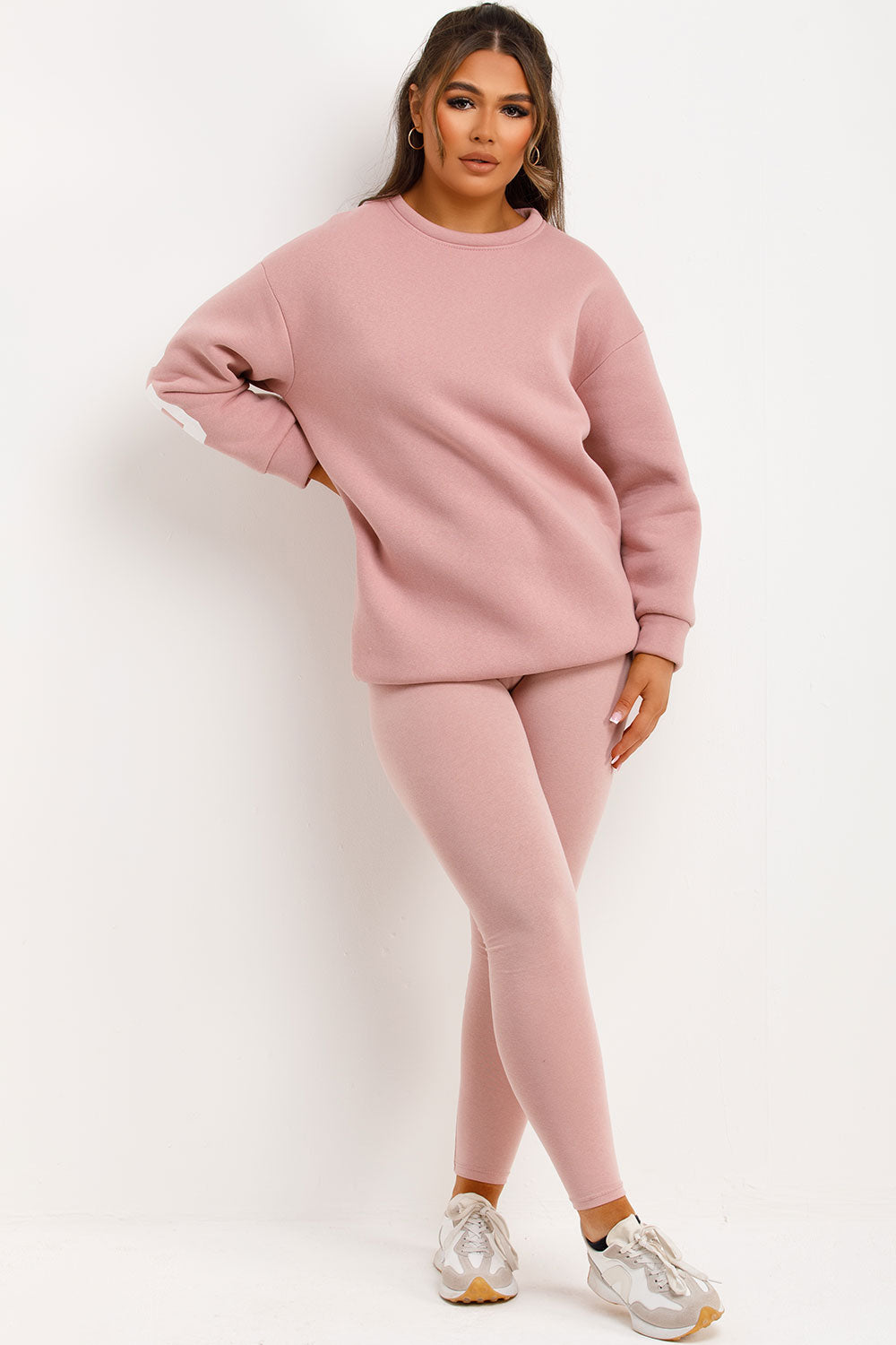 pink two piece loungewear set matching sweatshirt and leggings co ord airport outfit