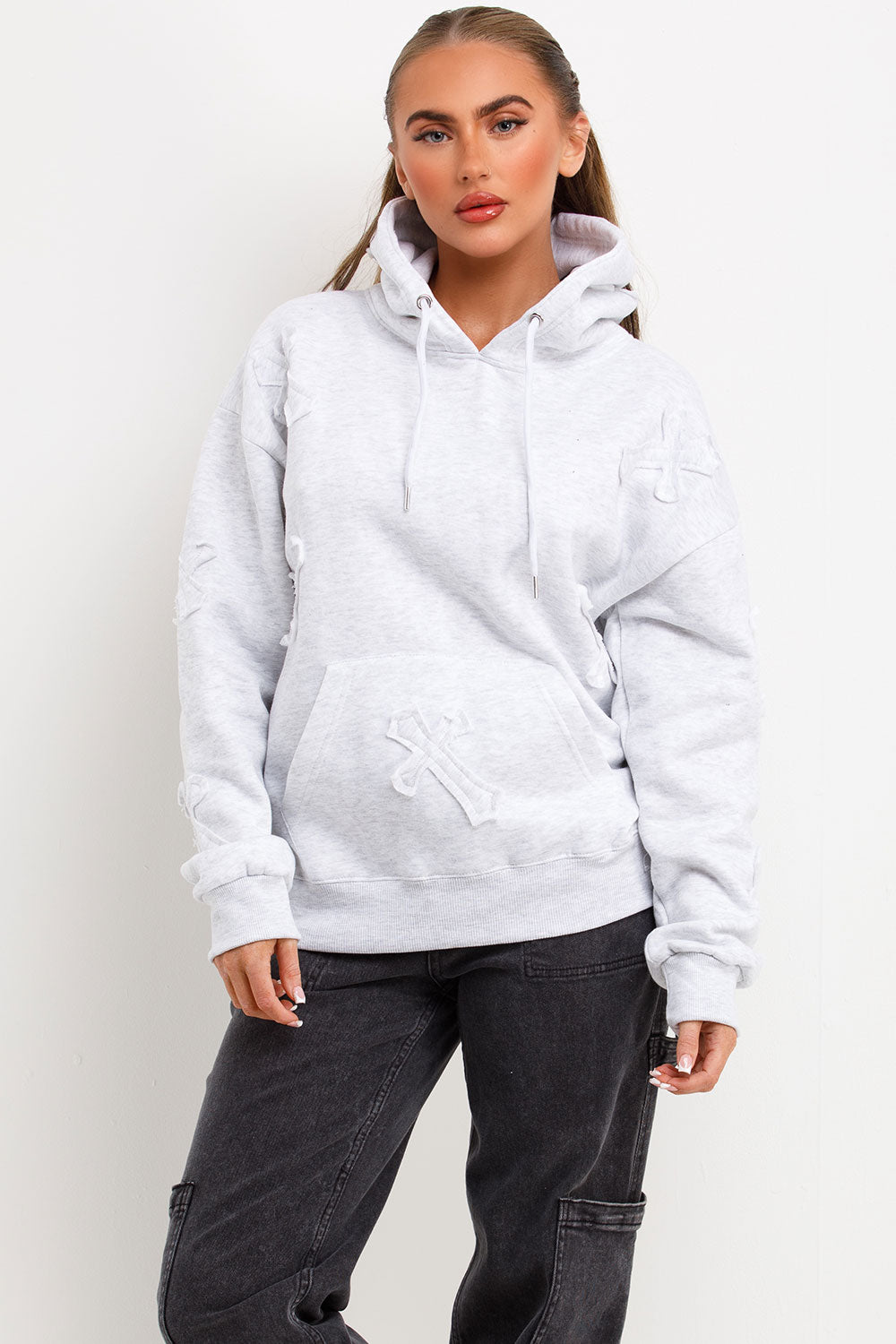 cross applique hoodie with kangaroo pockets styledup