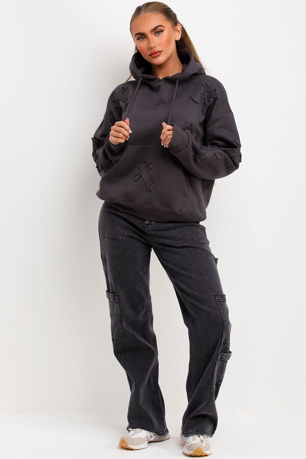 womens oversized hooded sweatshirt with cross applique