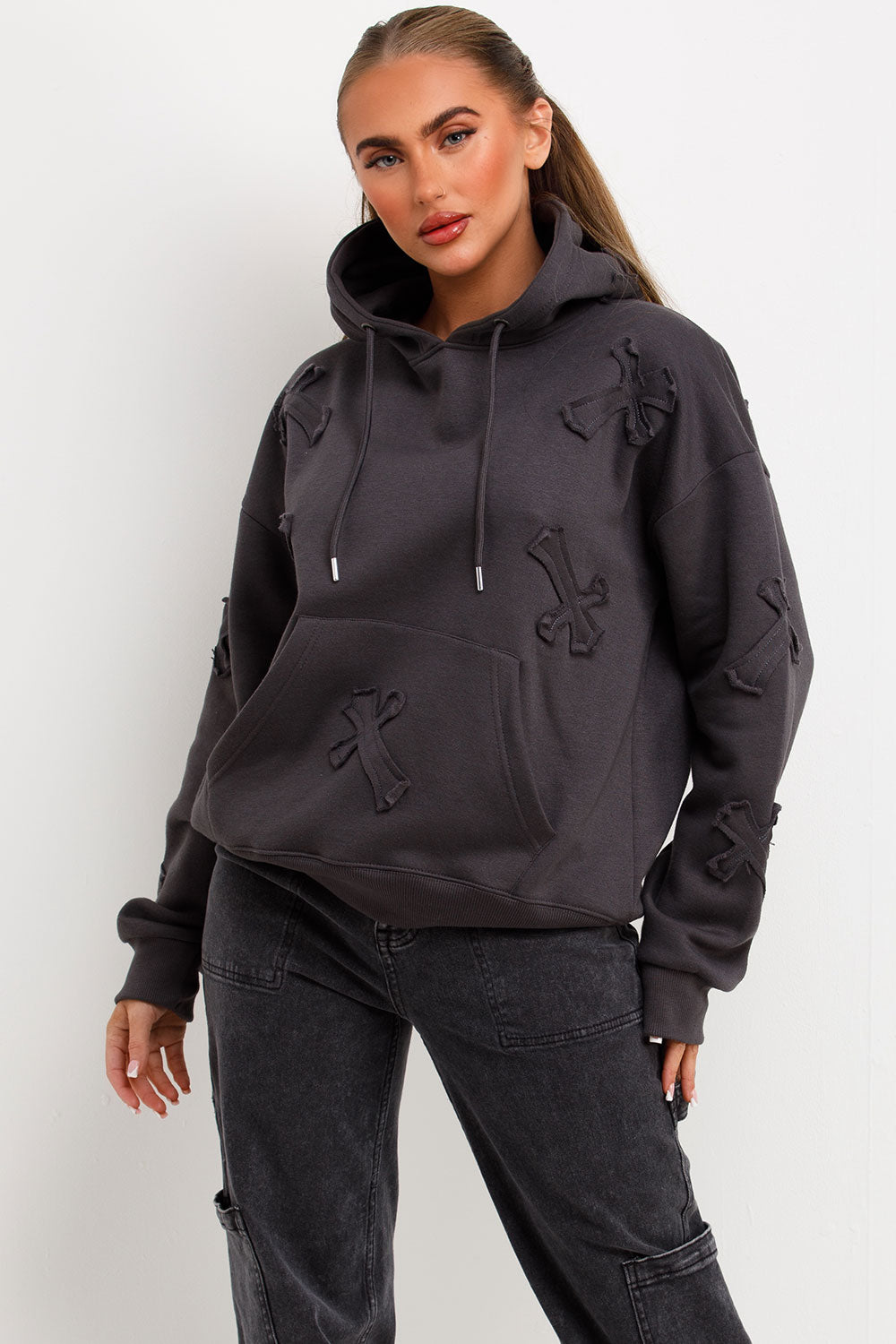 cross applique hoodie with kangaroo pockets styledup
