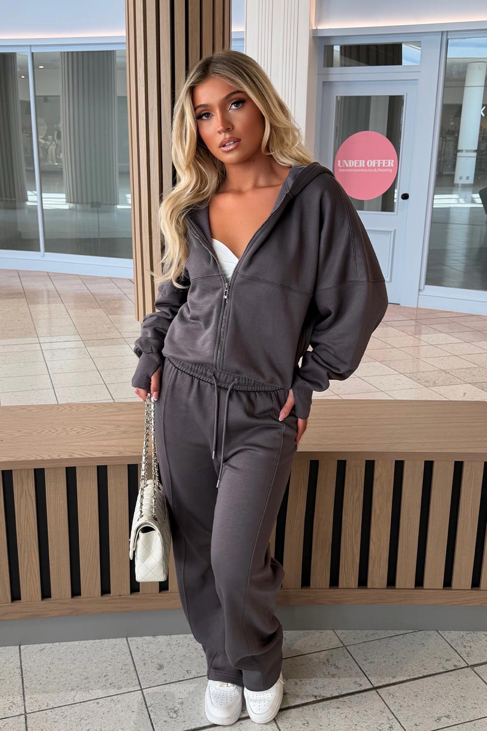 zip up hoodie and ide leg joggers lounge set airport outfit styledup uk