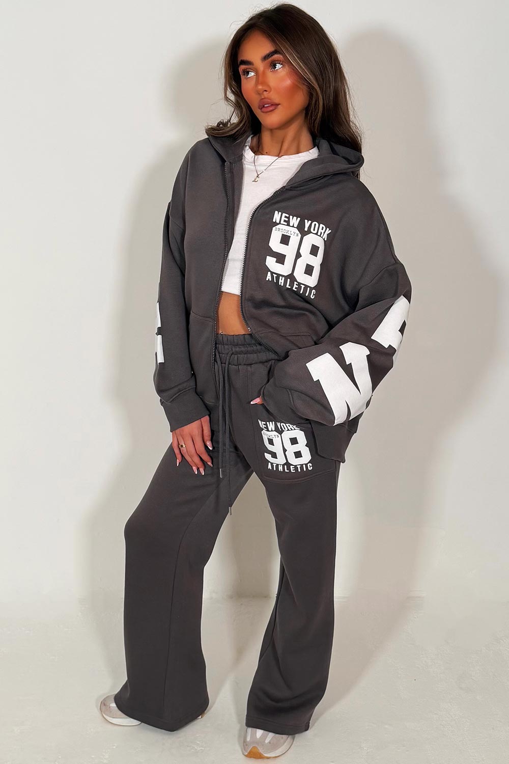 womens oversized zip up hooded sweatshirt and wide leg jogger loungewear set with new york athletic print styledup