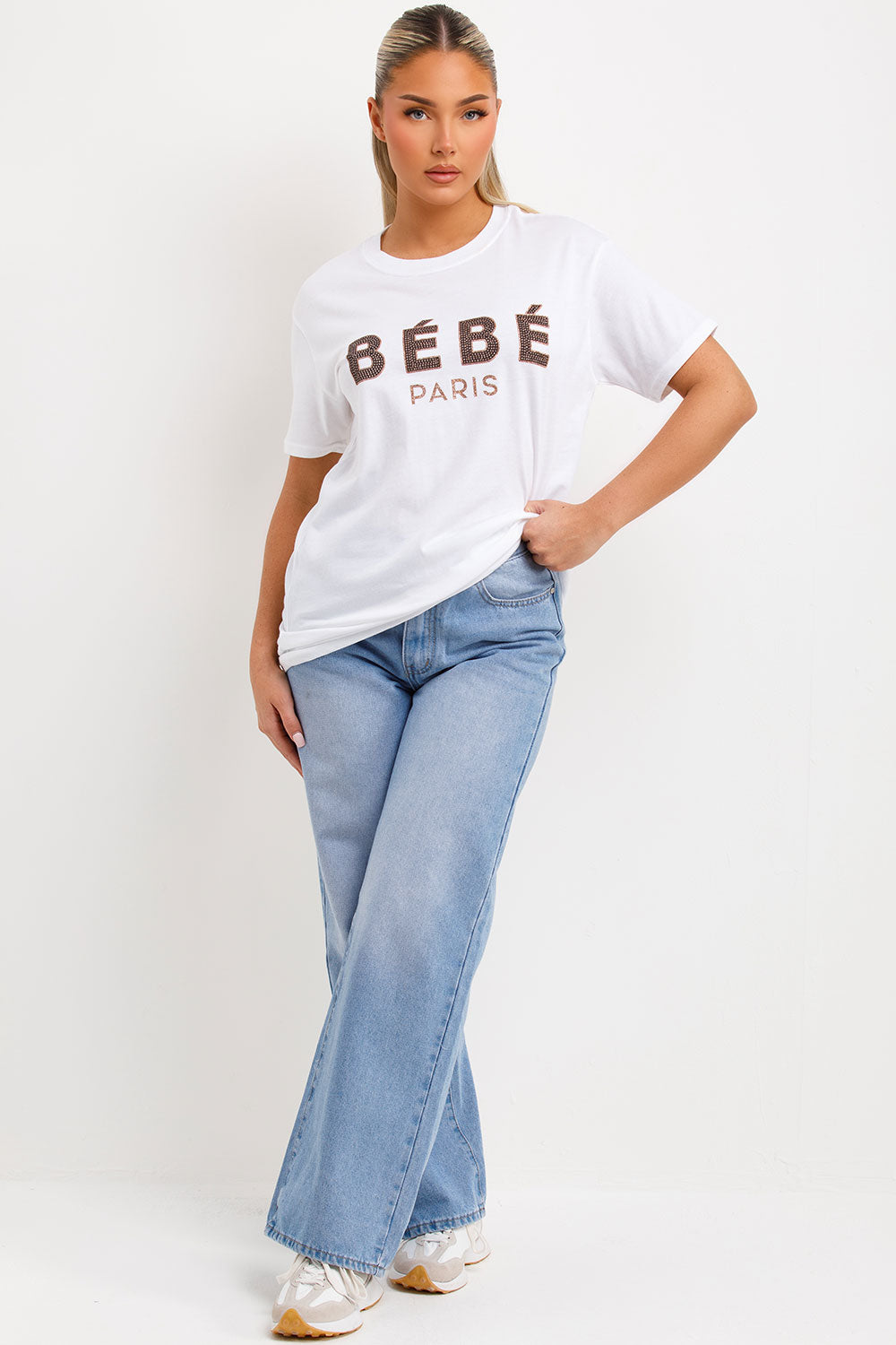 womens white oversized t shirt with bebe paris slogan