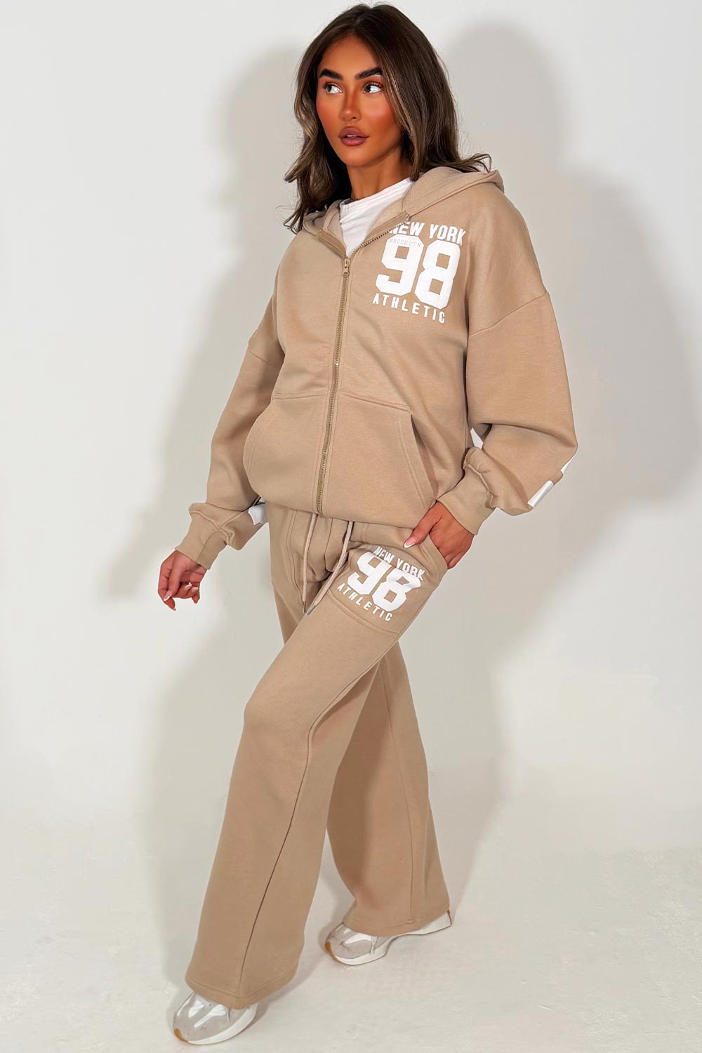womens hoodie with zip through long sleeves drop shoulder and wide leg joggers two piece tracksuit set new york athletic writing