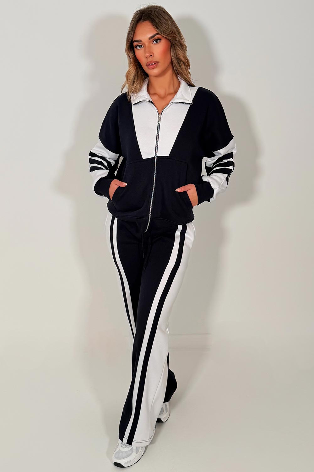 womens tracksuit zip up sweatshirt top & wide leg jogger airport outfit with stripe detail
