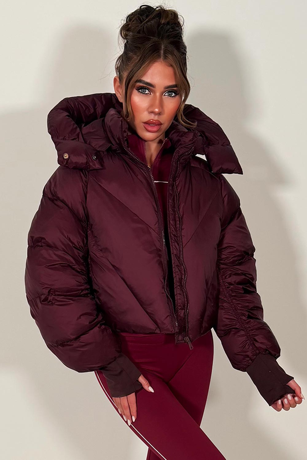 winter puffer jacket with hood for womens in burgundy colour