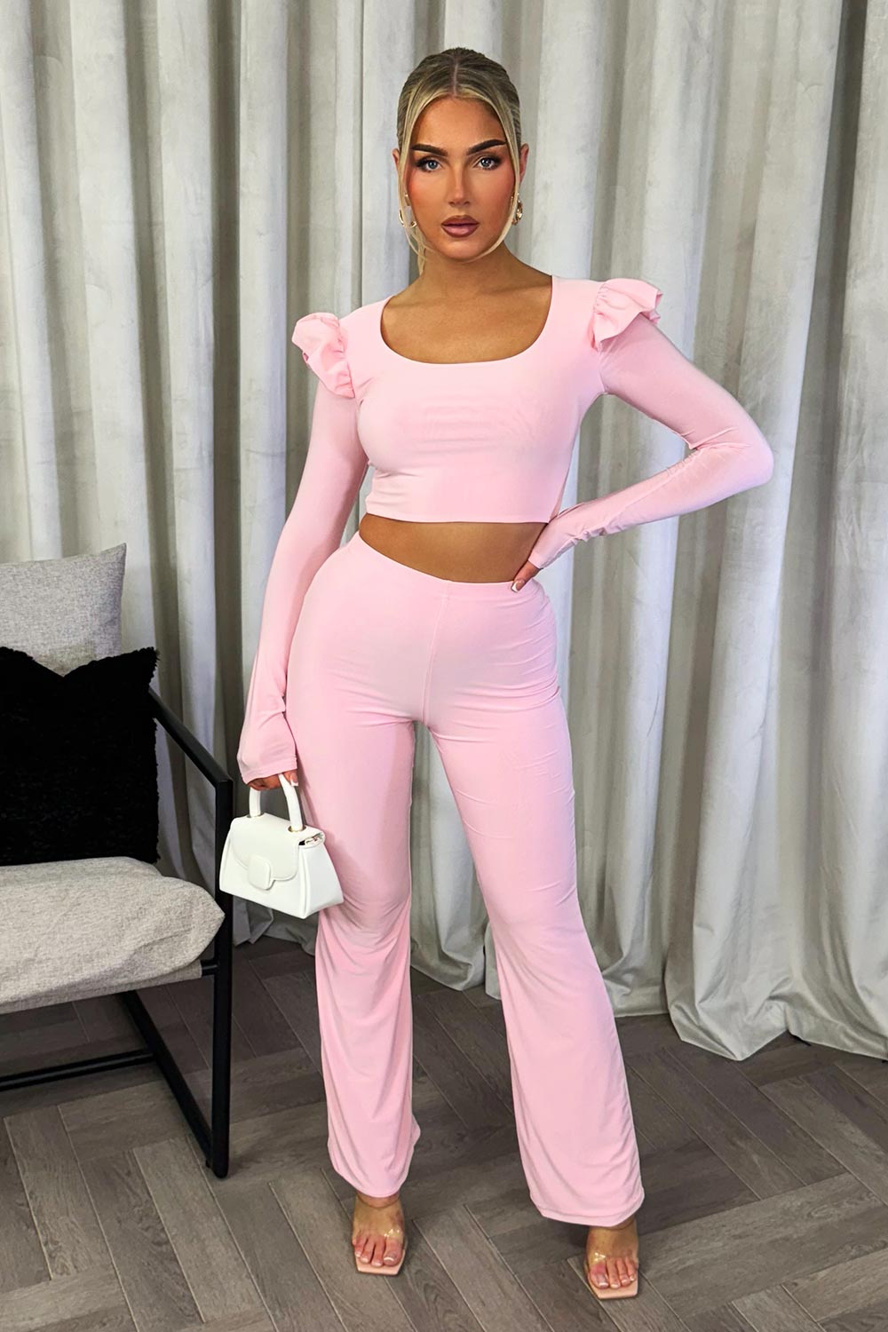 long sleeve frill shoulder crop top and straight leg trousers two piece co ord going out outfit