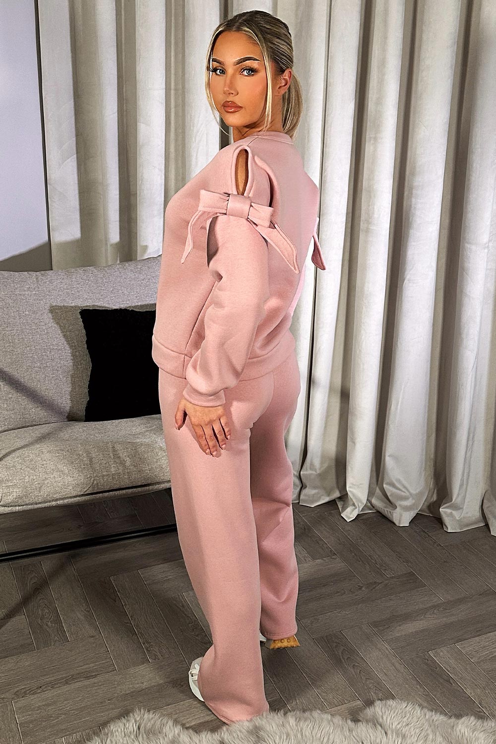 pink cut out shoulder bow detail sweatshirt and straight leg joggers loungewear set