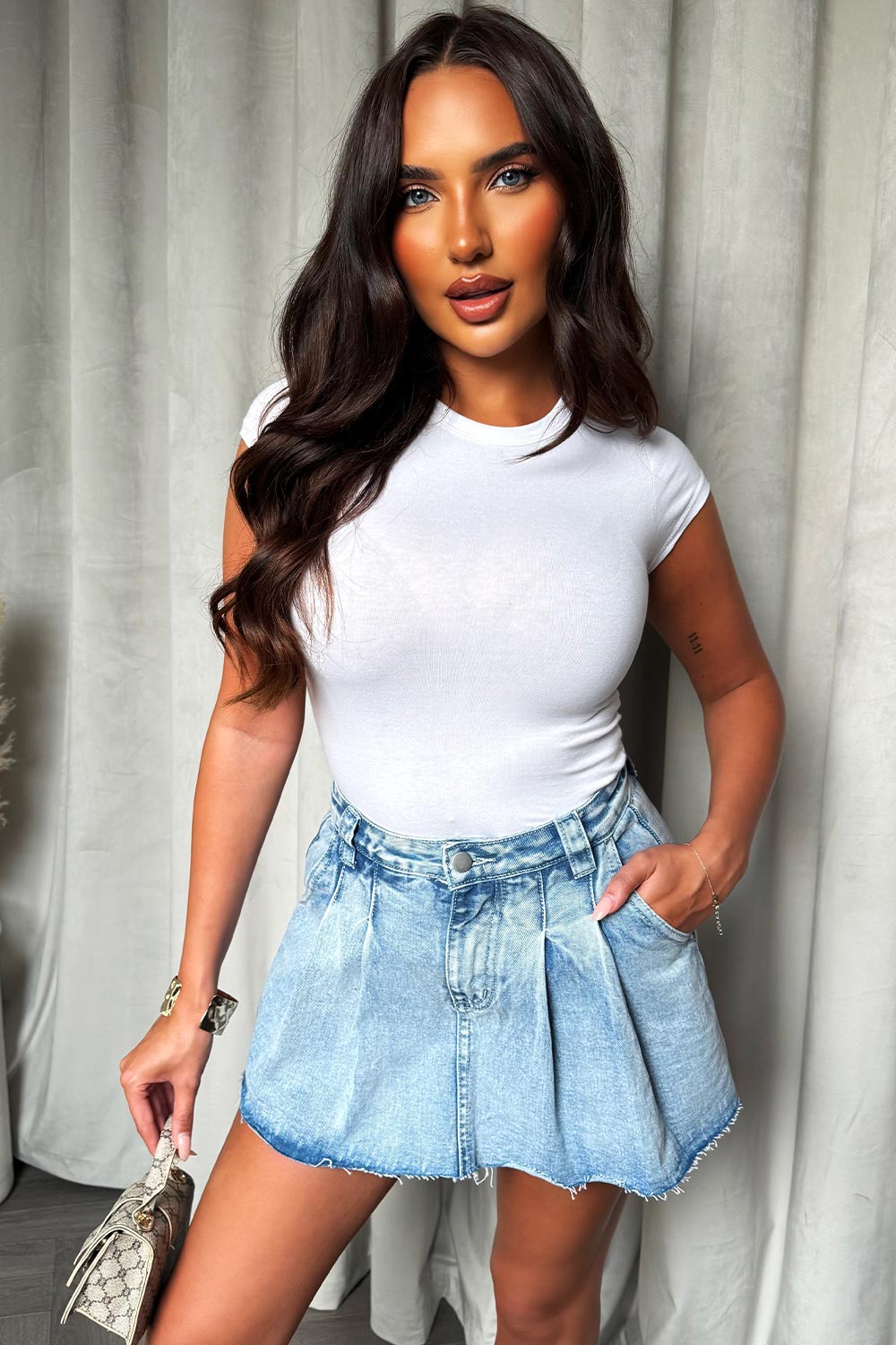 skort in light wash denim for womens summer holiday outfit styled up