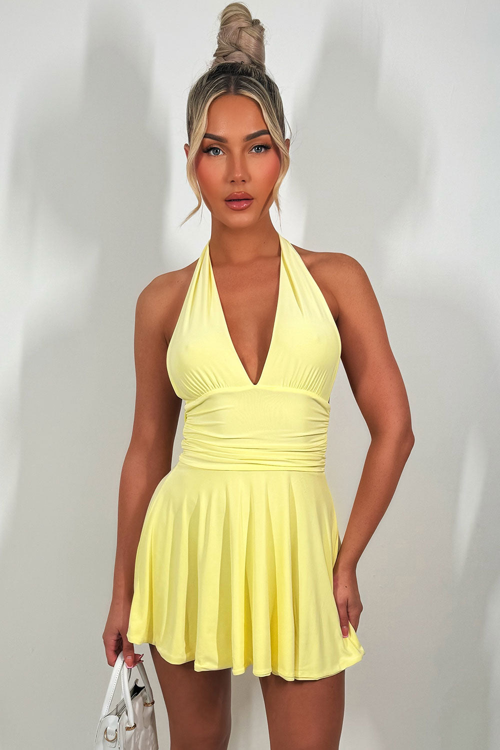 plunge halter neck mini dress with open back