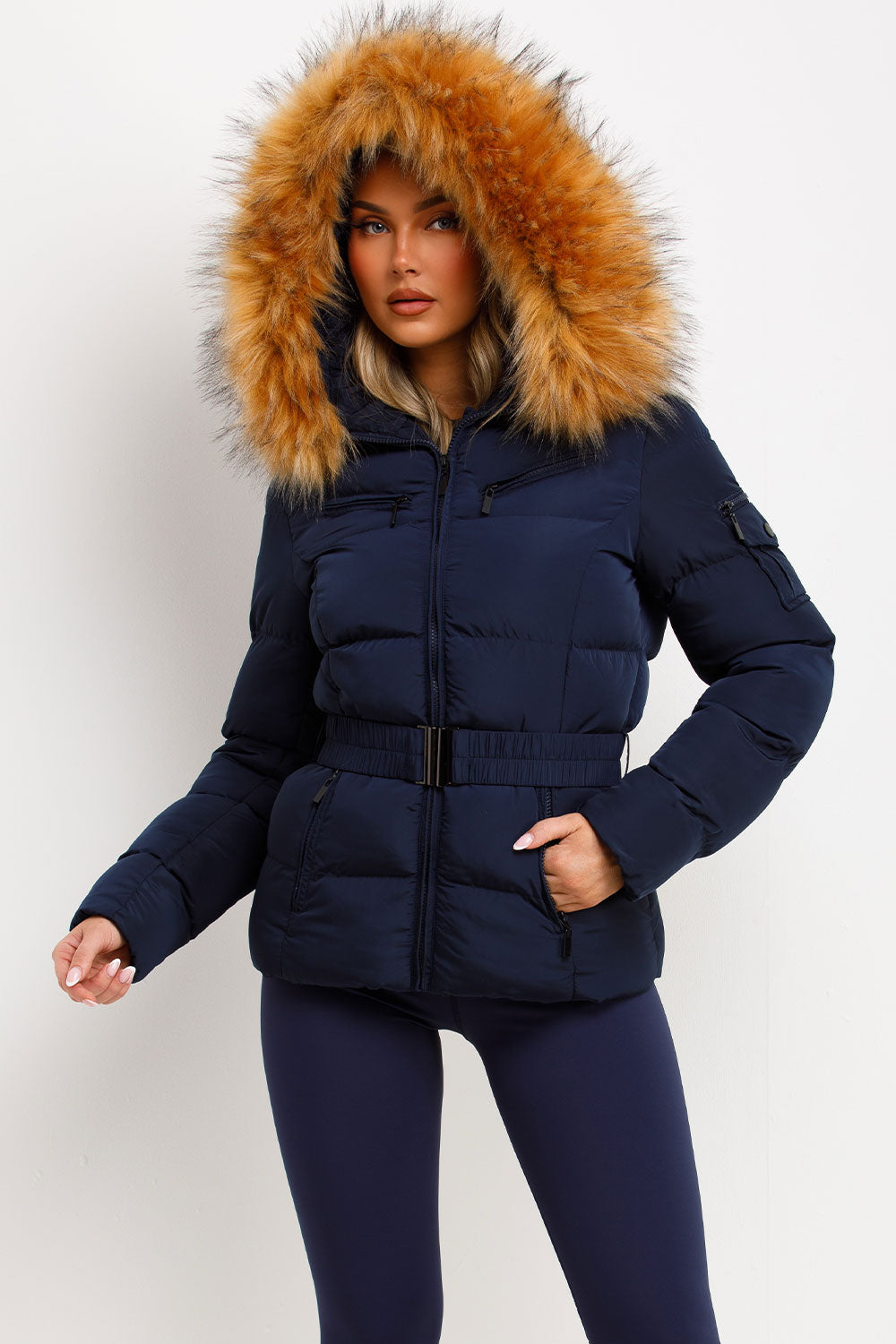 puffer jacket with fluffy fur hood styled up