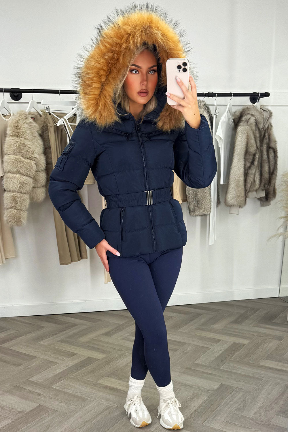 women’s belted puffer jacket fur hood navy styled up