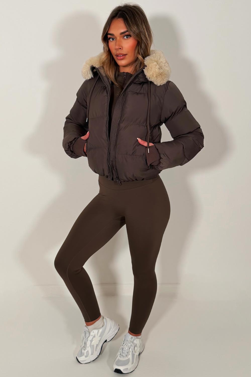 womens brown puffer jacket with faux fur hood for winter zara uk